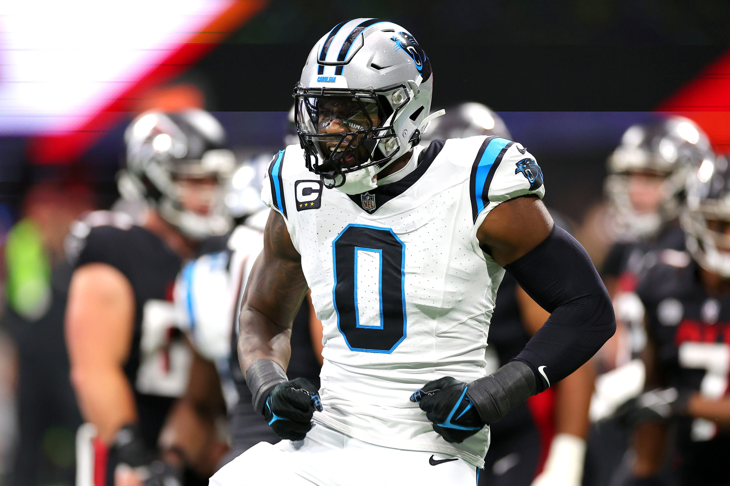 ATLANTA, GEORGIA - SEPTEMBER 10: Brian Burns #0 of the Carolina Panthers reacts after forcing a fumble during the first quarter against the Atlanta Falcons at Mercedes-Benz Stadium on September 10, 2023 in Atlanta, Georgia. Kevin C. Cox/Getty Images