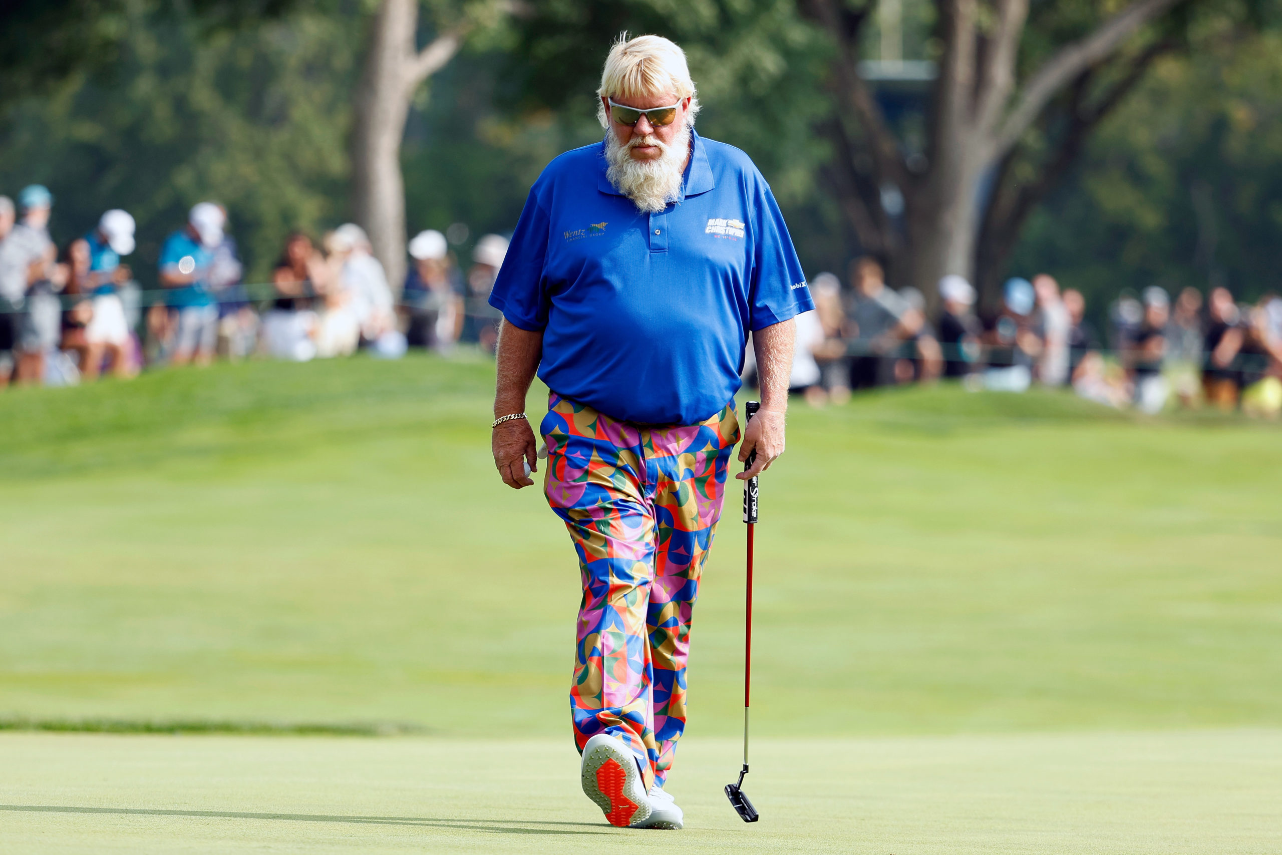 SIOUX FALLS, SOUTH DAKOTA - SEPTEMBER 16: John Daly of the United States walks along the 16th hole during the second round of the Sanford International at Minnehaha Country Club on September 16, 2023 in Sioux Falls, South Dakota. David Berding/Getty Images
