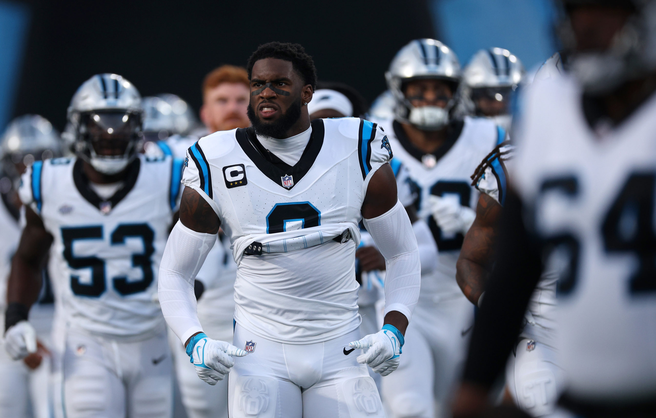 CHARLOTTE, NORTH CAROLINA - SEPTEMBER 18: Brian Burns #0 of the Carolina Panthers looks on as he is introduced prior to the first half of a game against the New Orleans Saints at Bank of America Stadium on September 18, 2023 in Charlotte, North Carolina. Jared C. Tilton/Getty Images