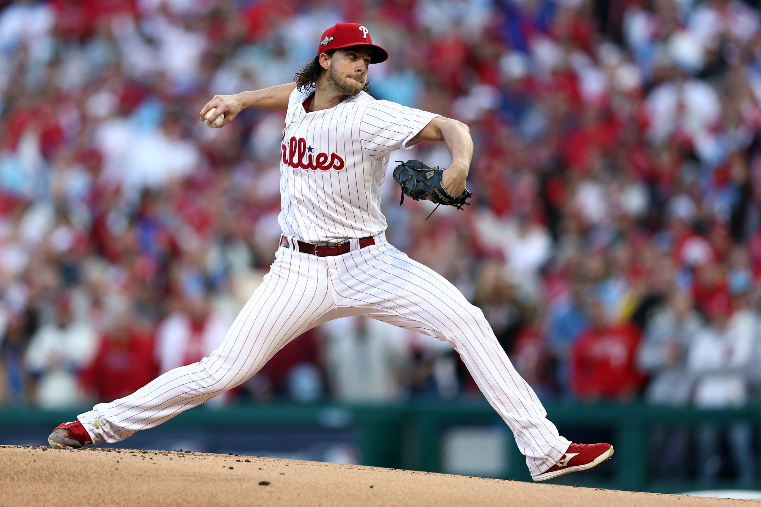 PHILADELPHIA, PENNSYLVANIA - OCTOBER 23: Aaron Nola #27 of the Philadelphia Phillies pitches in the first inning against the Arizona Diamondbacks during Game Six of the Championship Series at Citizens Bank Park on October 23, 2023 in Philadelphia, Pennsylvania. Elsa/Getty Images