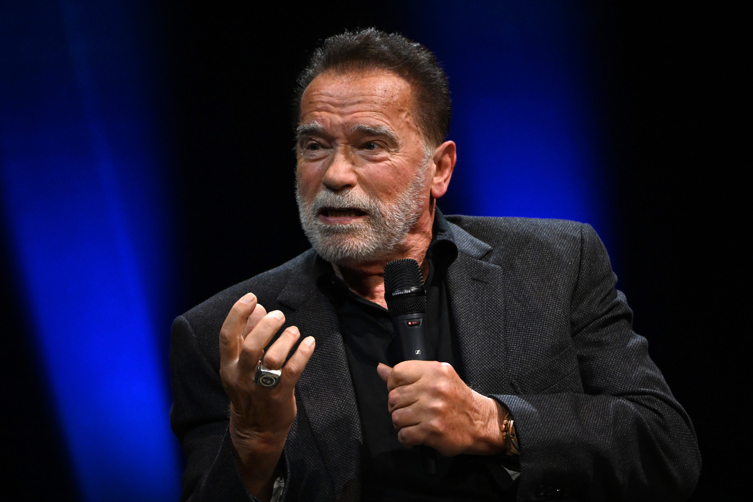 LONDON, ENGLAND - OCTOBER 24: EXCLUSIVE COVERAGE Arnold Schwarzenegger speaks onstage at an Evening with Arnold Schwarzenegger presented by Fane at London Palladium on October 24, 2023 in London, England. (Photo by Jeff Spicer/Getty Images for Fane)