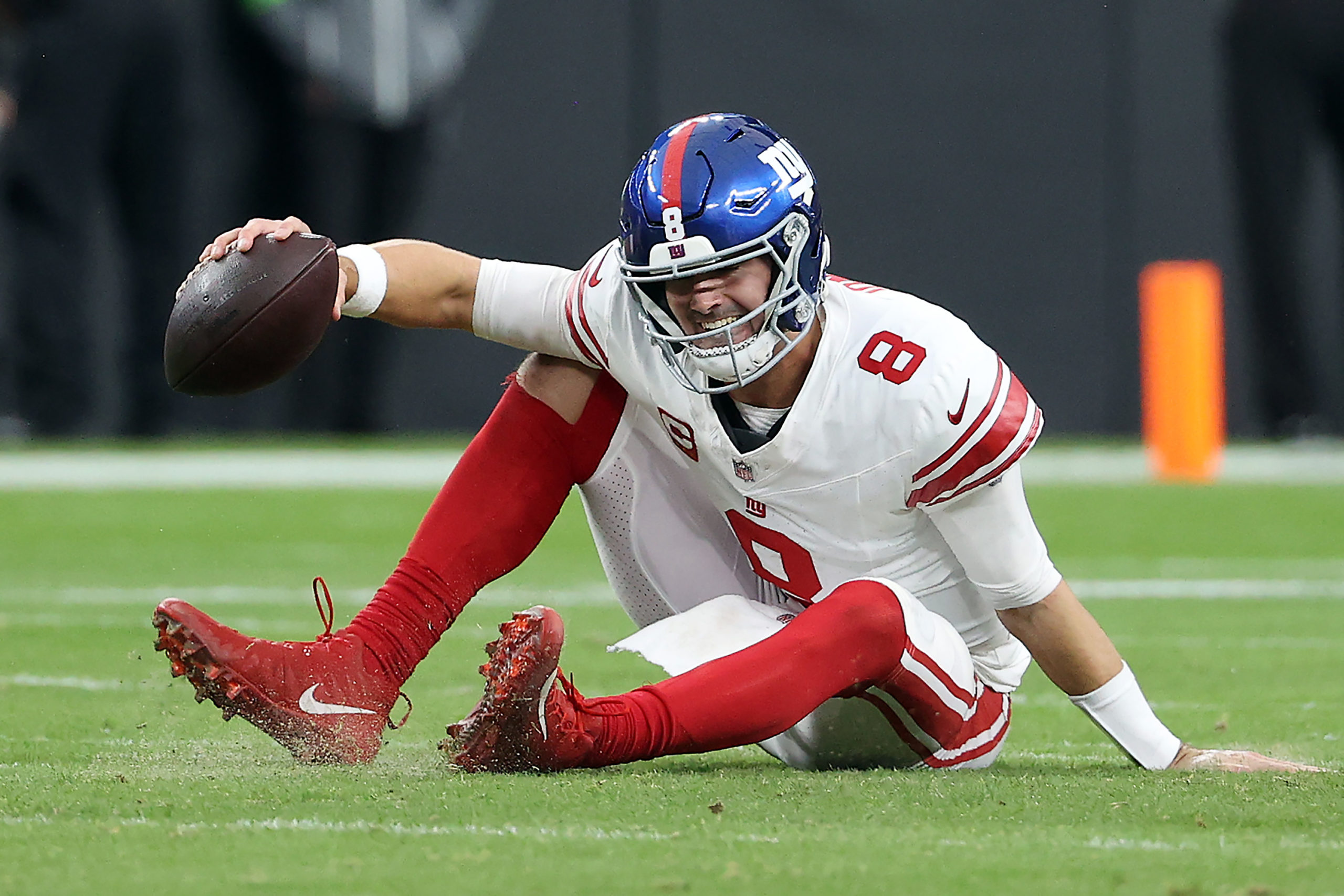 LAS VEGAS, NEVADA - NOVEMBER 05: Daniel Jones #8 of the New York Giants reacts after falling down in the first quarter of a game against the Las Vegas Raiders at Allegiant Stadium on November 05, 2023 in Las Vegas, Nevada. Ian Maule/Getty Images