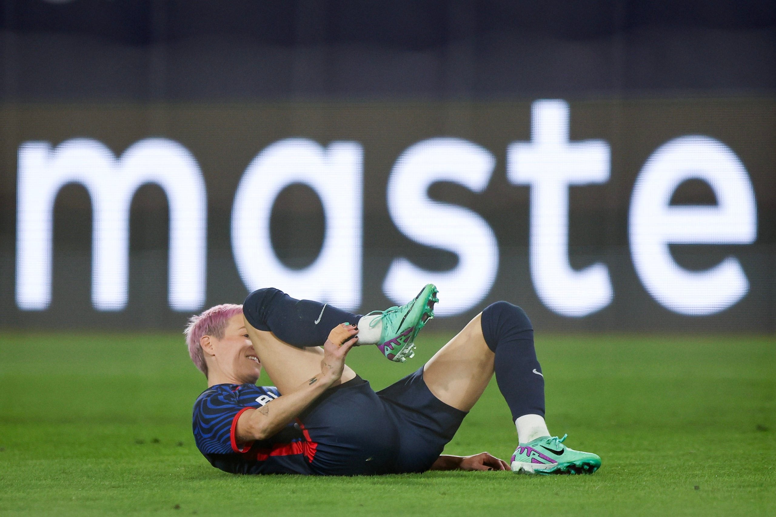 SAN DIEGO, CALIFORNIA - NOVEMBER 11: Megan Rapinoe #15 of OL Reign is injured in the first half against the NJ/NY Gotham FC during the 2023 NWSL Championship game at Snapdragon Stadium on November 11, 2023 in San Diego, California. Meg Oliphant/Getty Images
