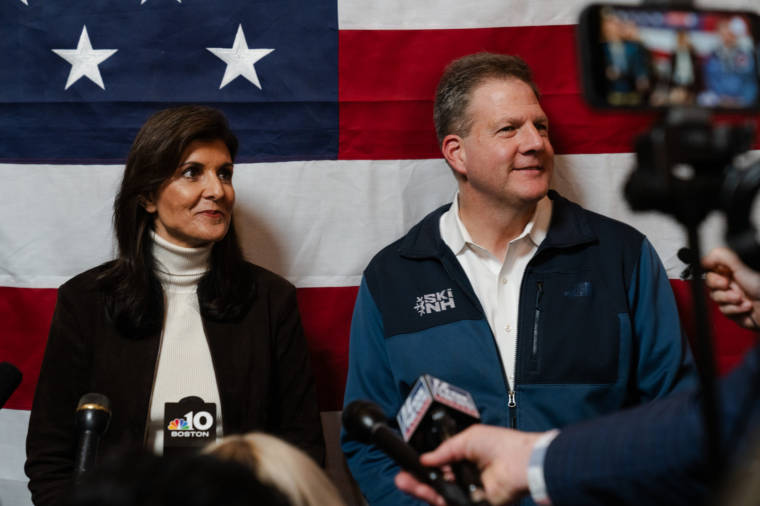 MANCHESTER, NEW HAMPSHIRE - DECEMBER 12: Republican Presidential Candidate Nikki Haley and New Hampshire Gov. Chris Sununu speak to members of the press after Sununu's endorsement of Haley during a Town hall event at McIntyre Ski Area on December 12, 2023 in Manchester, New Hampshire. (Photo by Sophie Park/Getty Images)