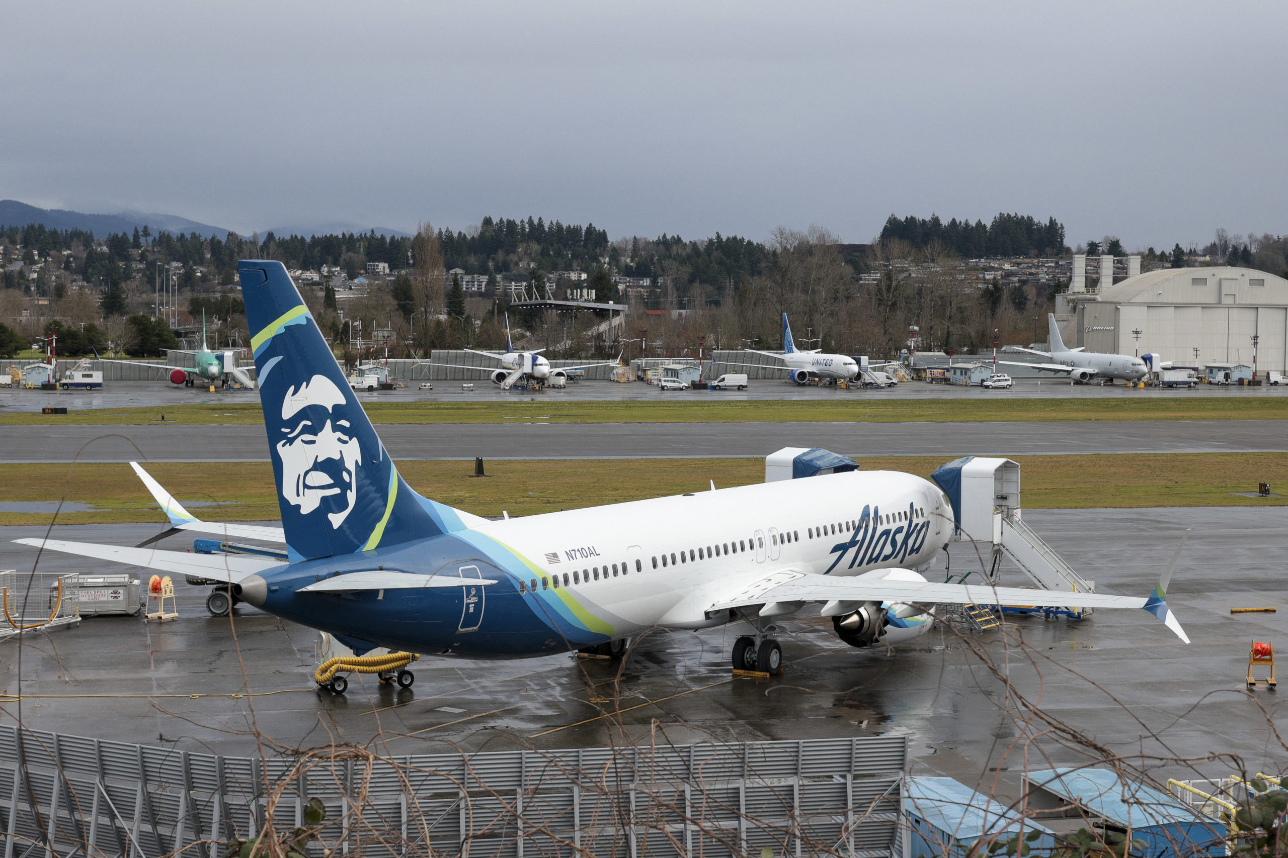 A Boeing 737 MAX 9 for Alaska Airlines is pictured along with other 737 aircraft at Renton Municipal Airport adjacent to Boeing's factory in Renton, Washington. (Photo by JASON REDMOND/AFP via Getty Images)