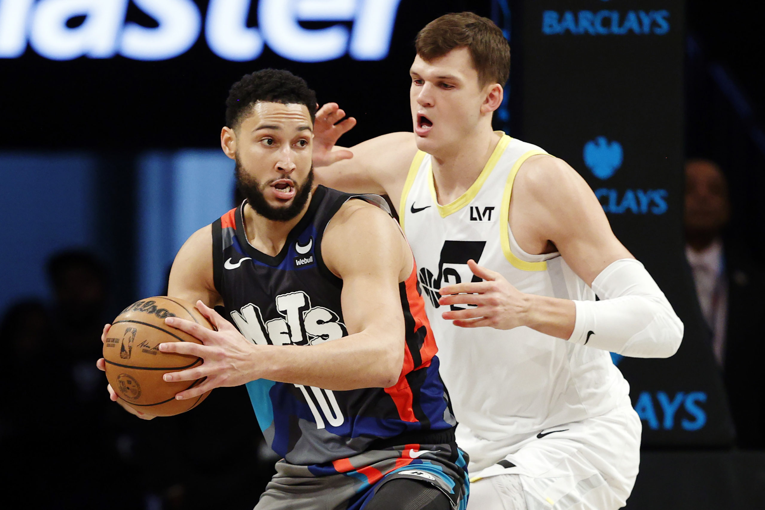NEW YORK, NEW YORK - JANUARY 29: Ben Simmons #10 of the Brooklyn Nets dribbles against Walker Kessler #24 of the Utah Jazz during the first half at Barclays Center on January 29, 2024 in the Brooklyn borough of New York City. Sarah Stier/Getty Images