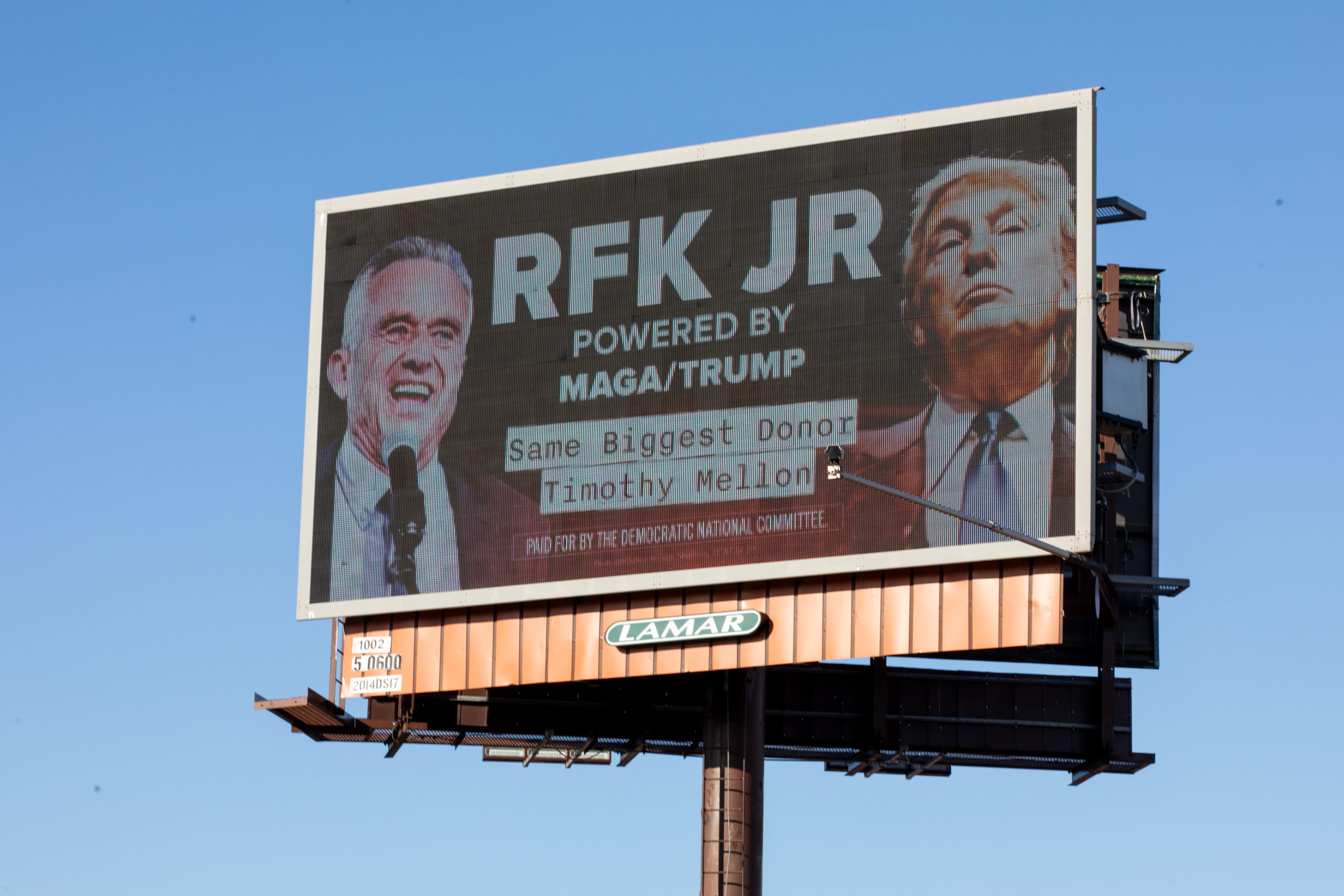 GRAND RAPIDS, MICHIGAN - FEBRUARY 9: As Robert F. Kennedy Jr. campaigns in Grand Rapids, billboard launched by the Democratic National Committee highlights how Robert F. Kennedy's Super PAC is allegedly receiving millions from Donald Trump's largest donor, Timothy Mellon on February 9, 2024 in Grand Rapids, Michigan. (Photo by Emily Elconin/Getty Images for DNC)
