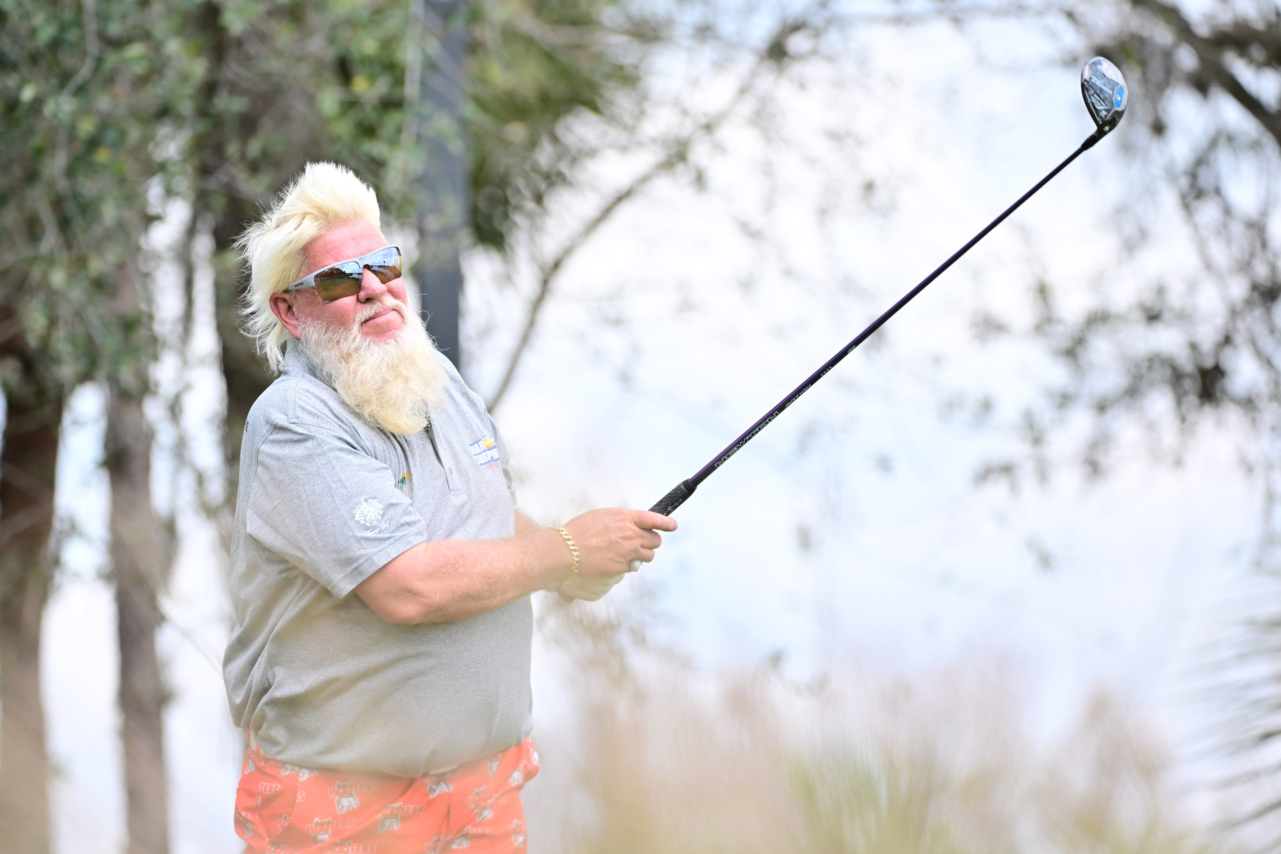 NAPLES, FLORIDA - FEBRUARY 17: John Daly of the United States plays his shot on the fifth tee during the second round of the Chubb Classic at Tiburon Golf Club on February 17, 2024 in Naples, Florida. Julio Aguilar/Getty Images