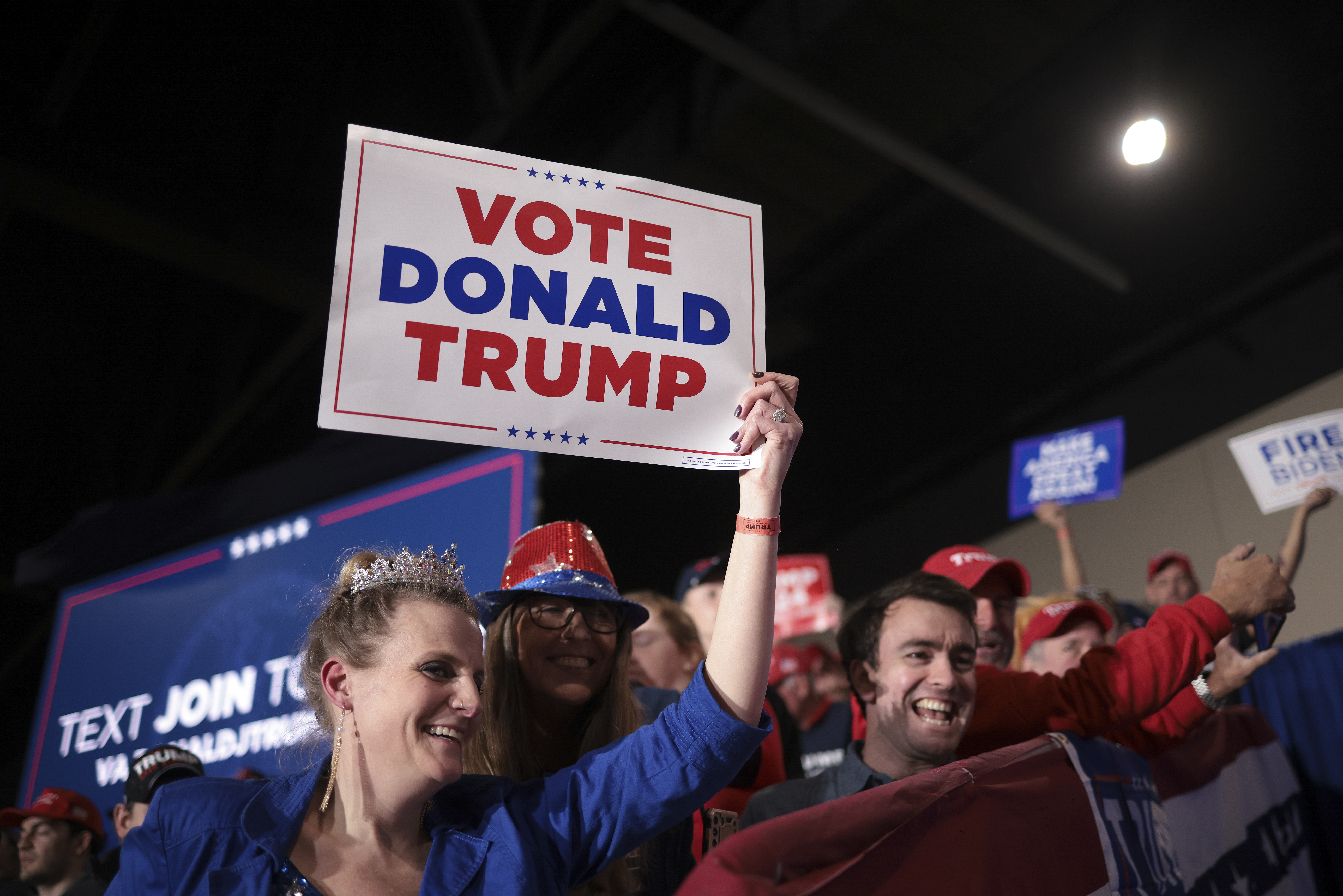  Supporters of Republican presidential candidate and former President Donald Trump cheer as Trump is introduced at a Get Out the Vote Rally March 2, 2024 in Richmond, Virginia. Sixteen states, including Virginia, will vote during Super Tuesday on March 5. (Photo by Win McNamee/Getty Images)
