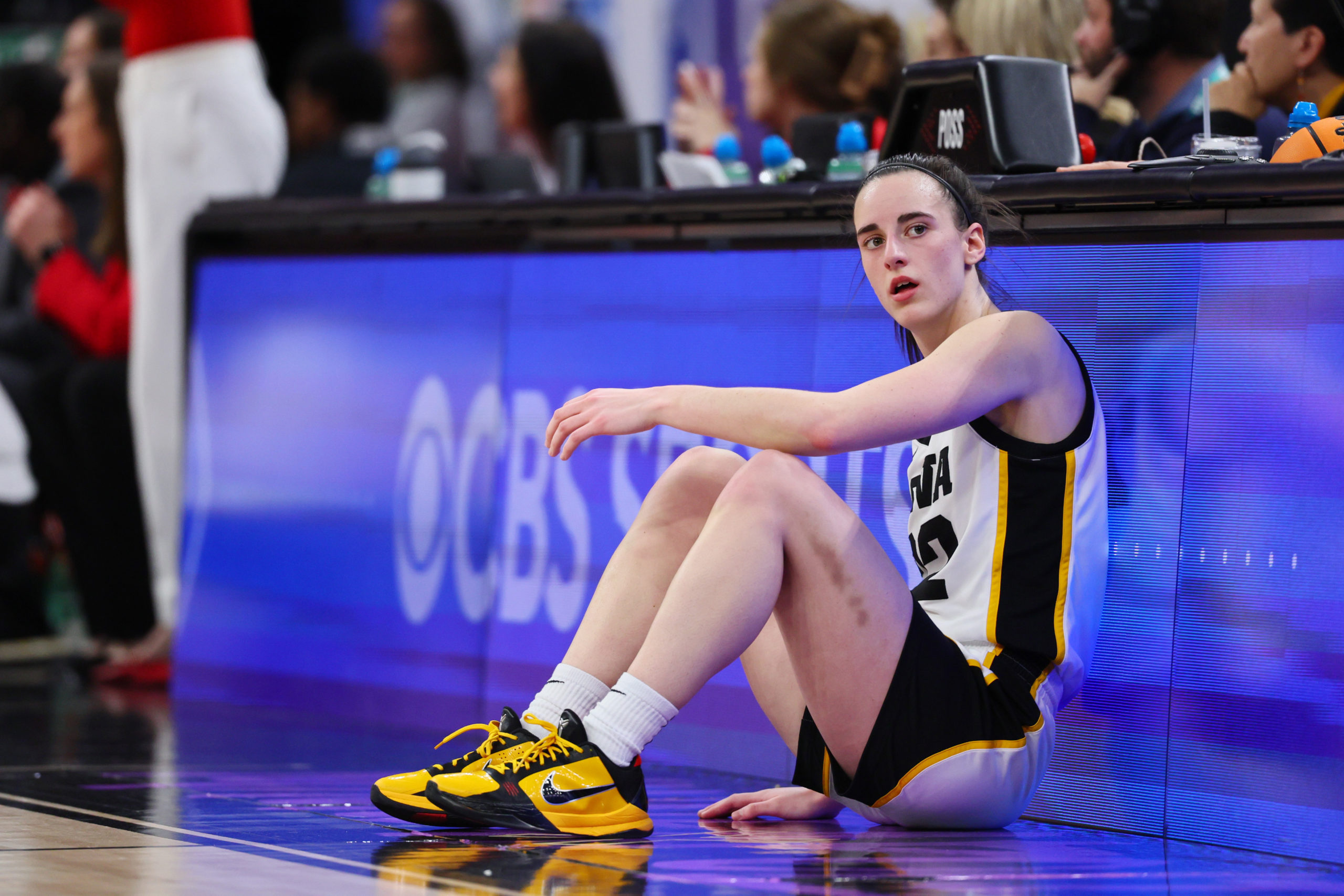 MINNEAPOLIS, MINNESOTA - MARCH 10: Caitlin Clark #22 of the Iowa Hawkeyes waits to enter the game in the first half against the Nebraska Cornhuskers during the Big Ten Women's Basketball Tournament Championship at Target Center on March 10, 2024 in Minneapolis, Minnesota. Adam Bettcher/Getty Images
