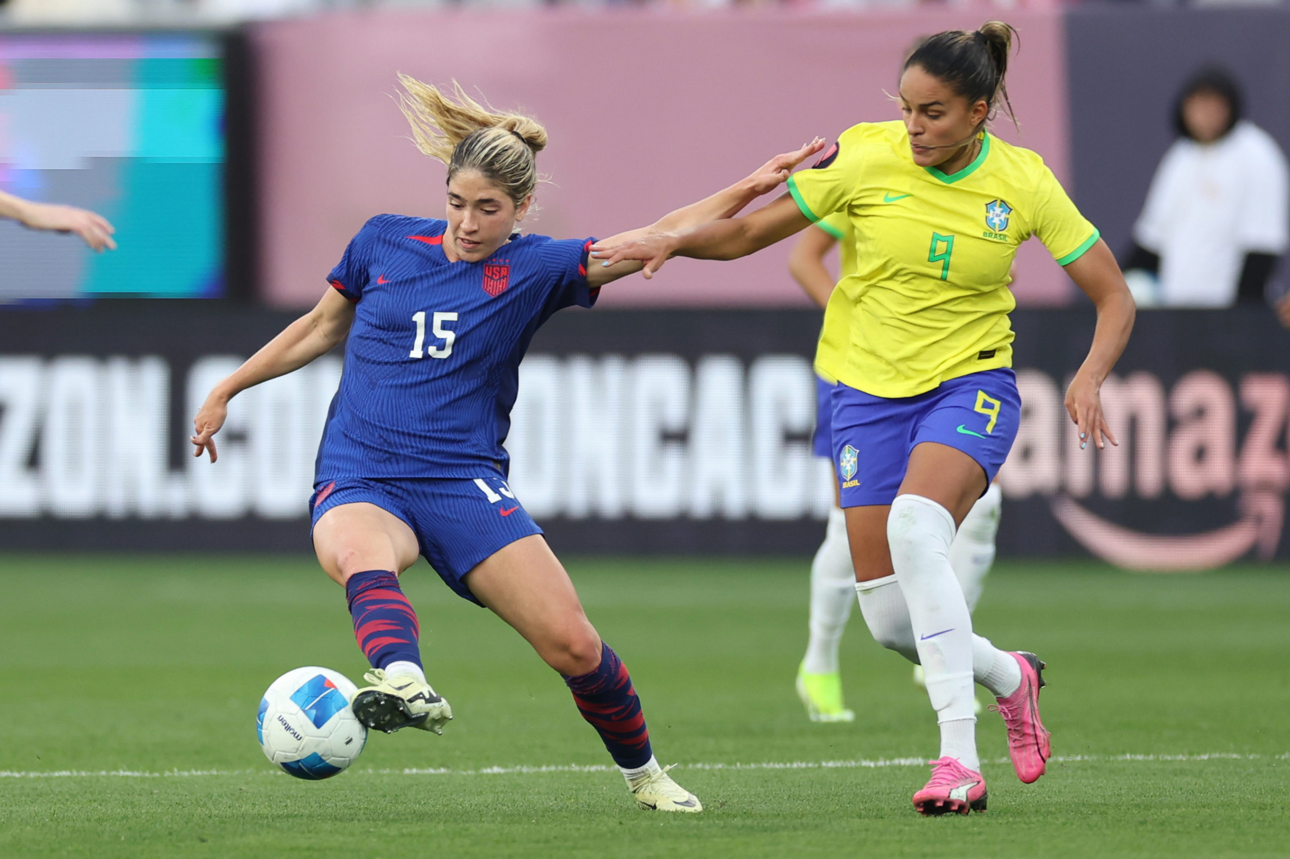 SAN DIEGO, CALIFORNIA - MARCH 10: Korbin Albert #15 of the United States is challenged by Gabi Nunes #9 of Brazil during the second half of the 2024 Concacaf W Gold Cup Final at Snapdragon Stadium on March 10, 2024 in San Diego, California. Sean M. Haffey/Getty Images
