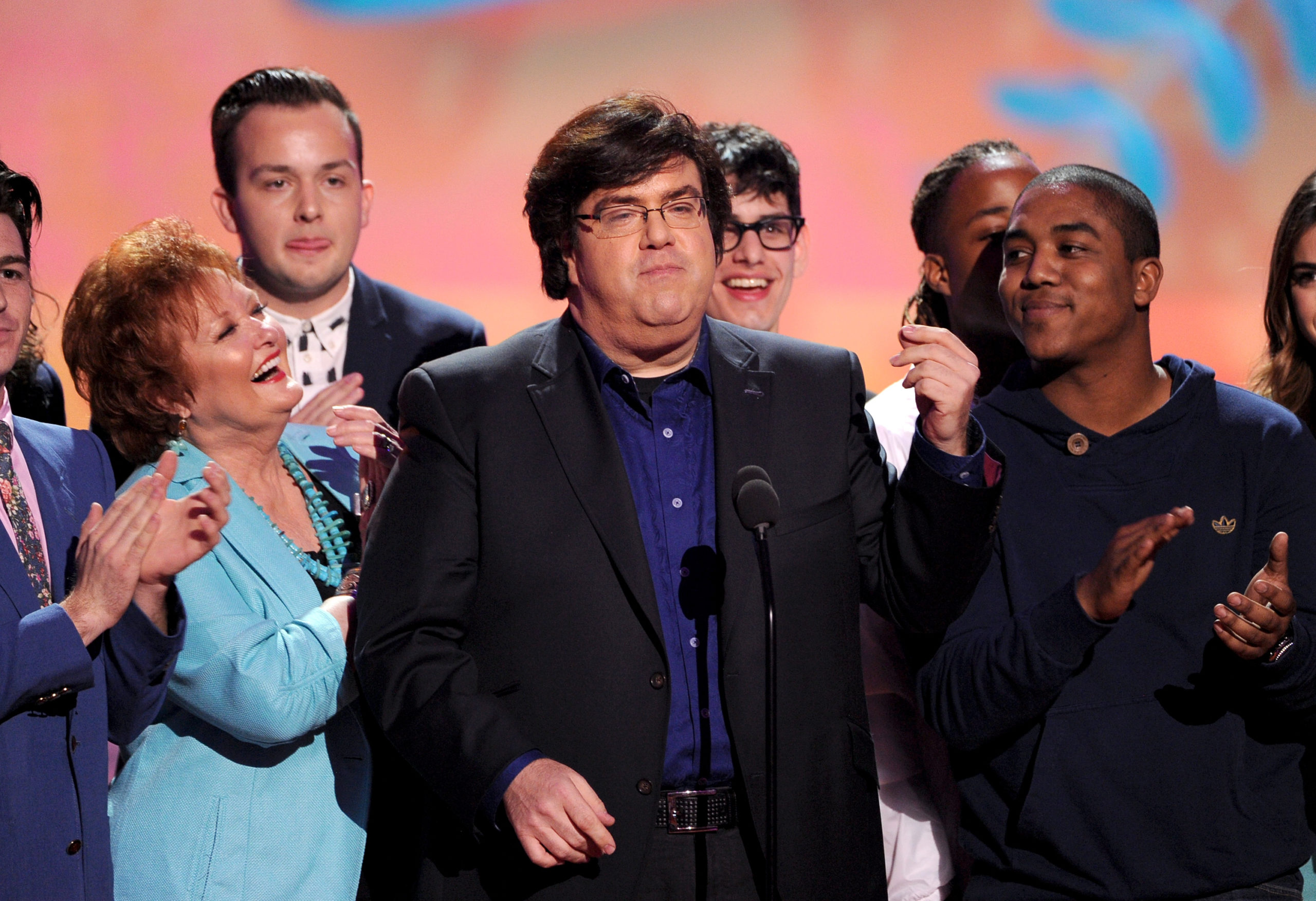 LOS ANGELES, CA - MARCH 29: Writer/producer Dan Schneider (C) accepts the Lifetime Achievement Award onstage with actors Maree Cheatham and Christopher Massey onstage during Nickelodeon's 27th Annual Kids' Choice Awards held at USC Galen Center on March 29, 2014 in Los Angeles, California. (Photo by Kevin Winter/Getty Images)