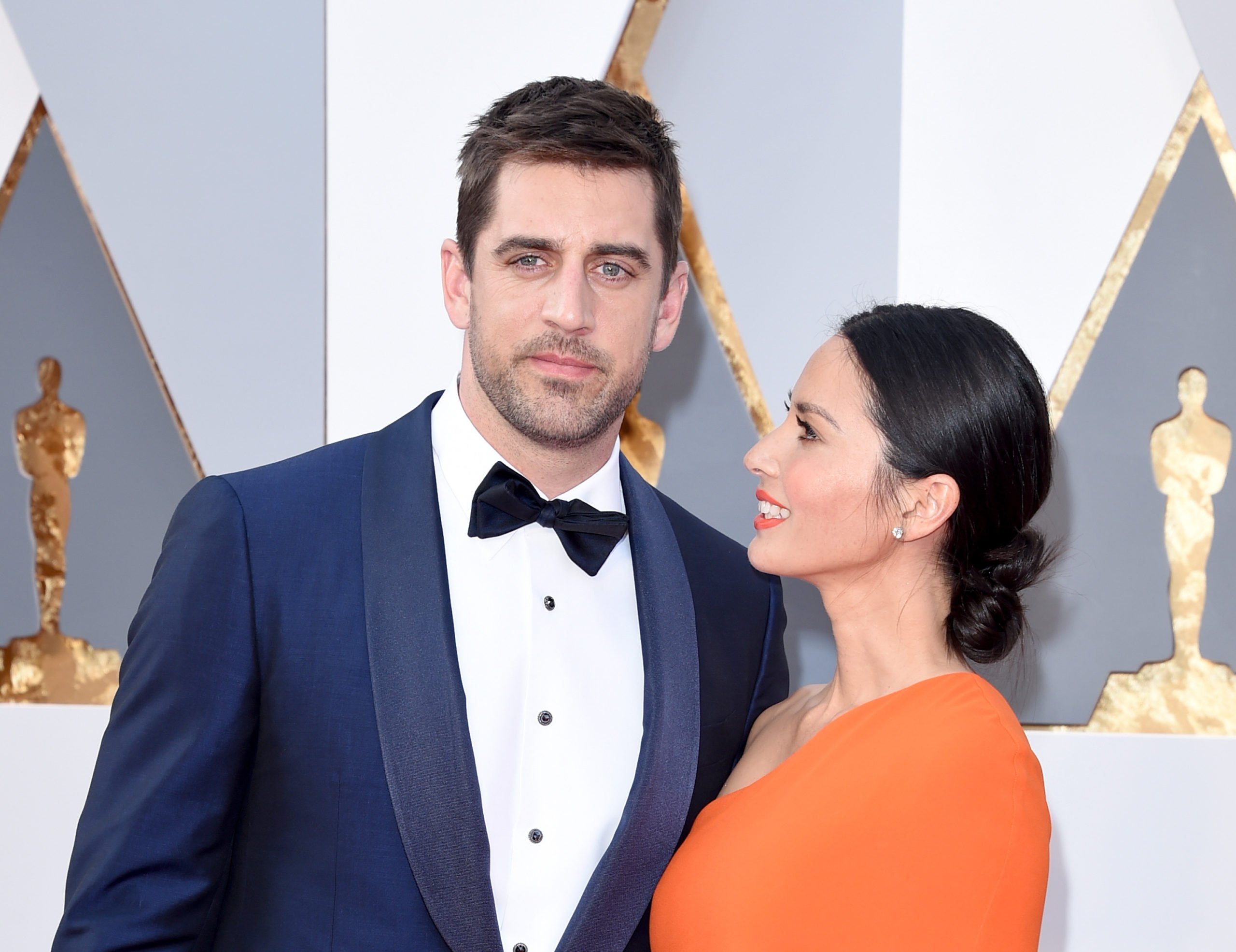 HOLLYWOOD, CA - FEBRUARY 28: NFL player Aaron Rodgers (L) and actress Olivia Munn attend the 88th Annual Academy Awards at Hollywood & Highland Center on February 28, 2016 in Hollywood, California. Jason Merritt/Getty Images