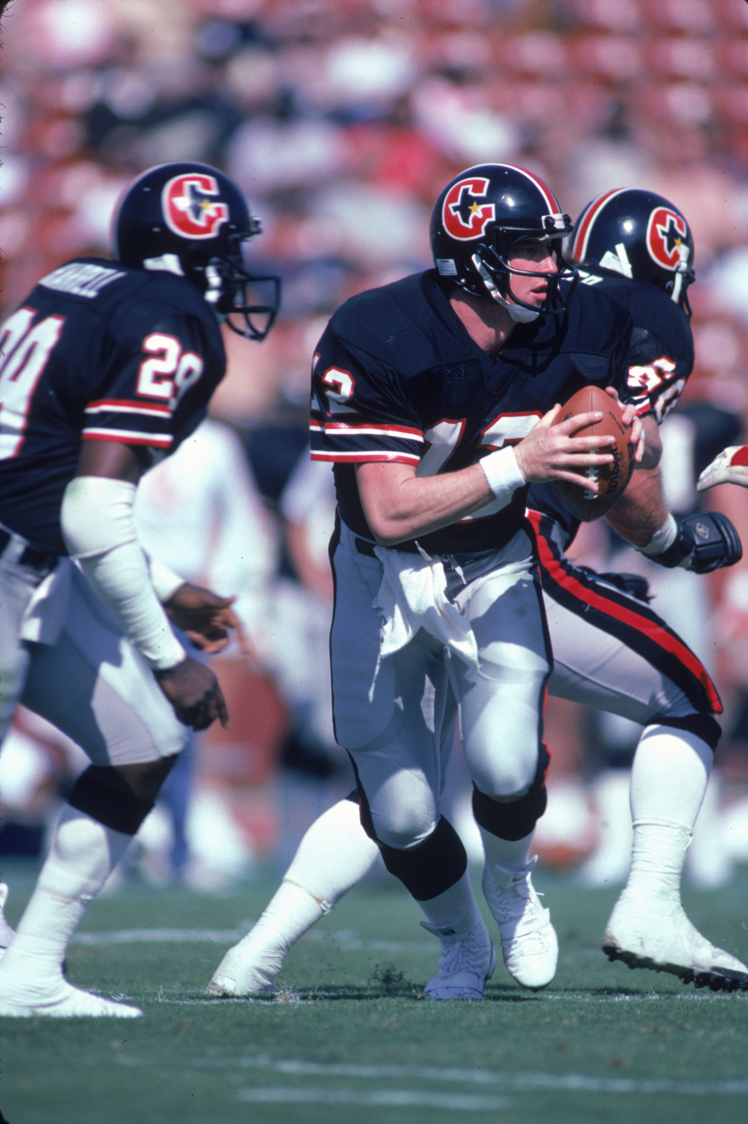 FEBRUARY 1985: Quarterback Jim Kelly #12 of the Houston Gamblers scrambles during a 1985 season USFL game. Stephen Dunn/Getty Images