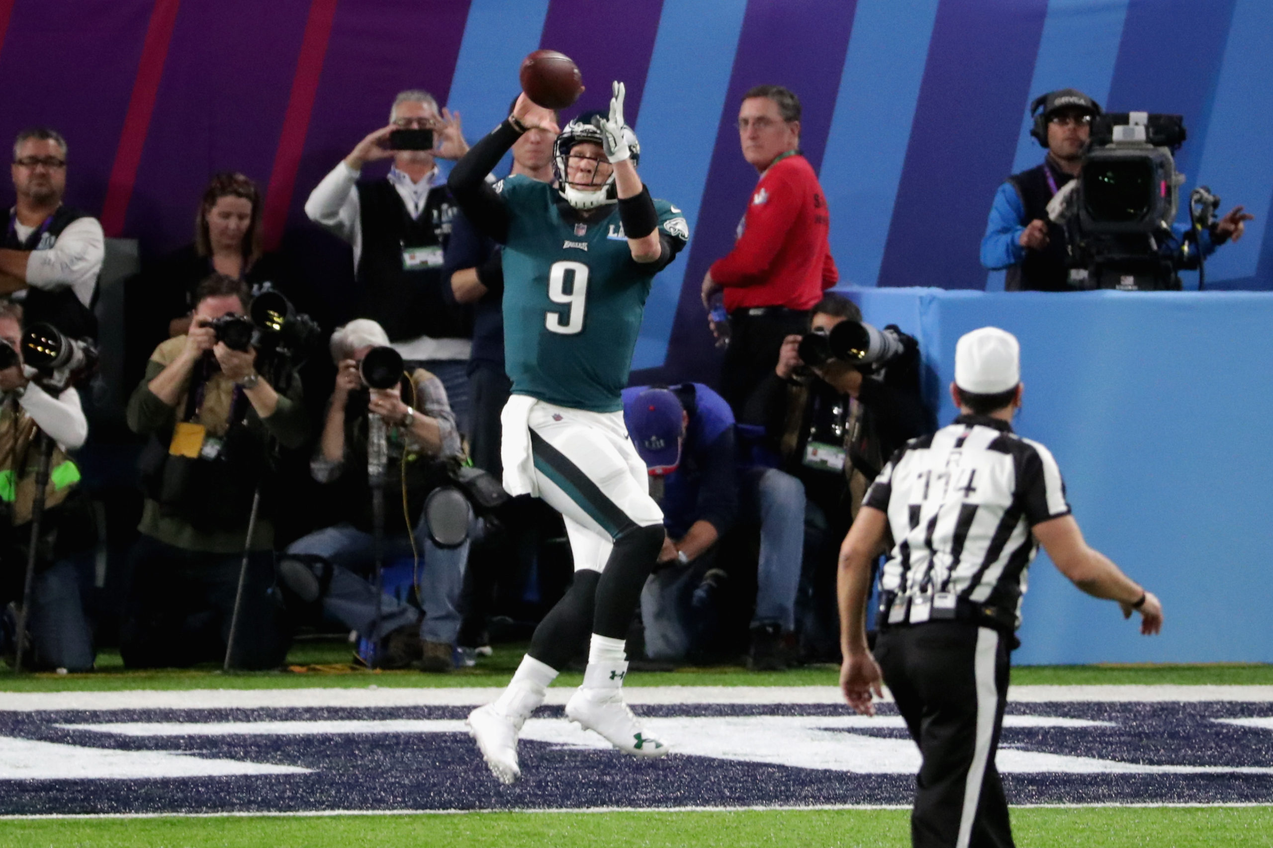 MINNEAPOLIS, MN - FEBRUARY 04: Nick Foles #9 of the Philadelphia Eagles catches a second quarter touchdown reception from teammate Trey Burton against the New England Patriots in Super Bowl LII at U.S. Bank Stadium on February 4, 2018 in Minneapolis, Minnesota. Streeter Lecka/Getty Images
