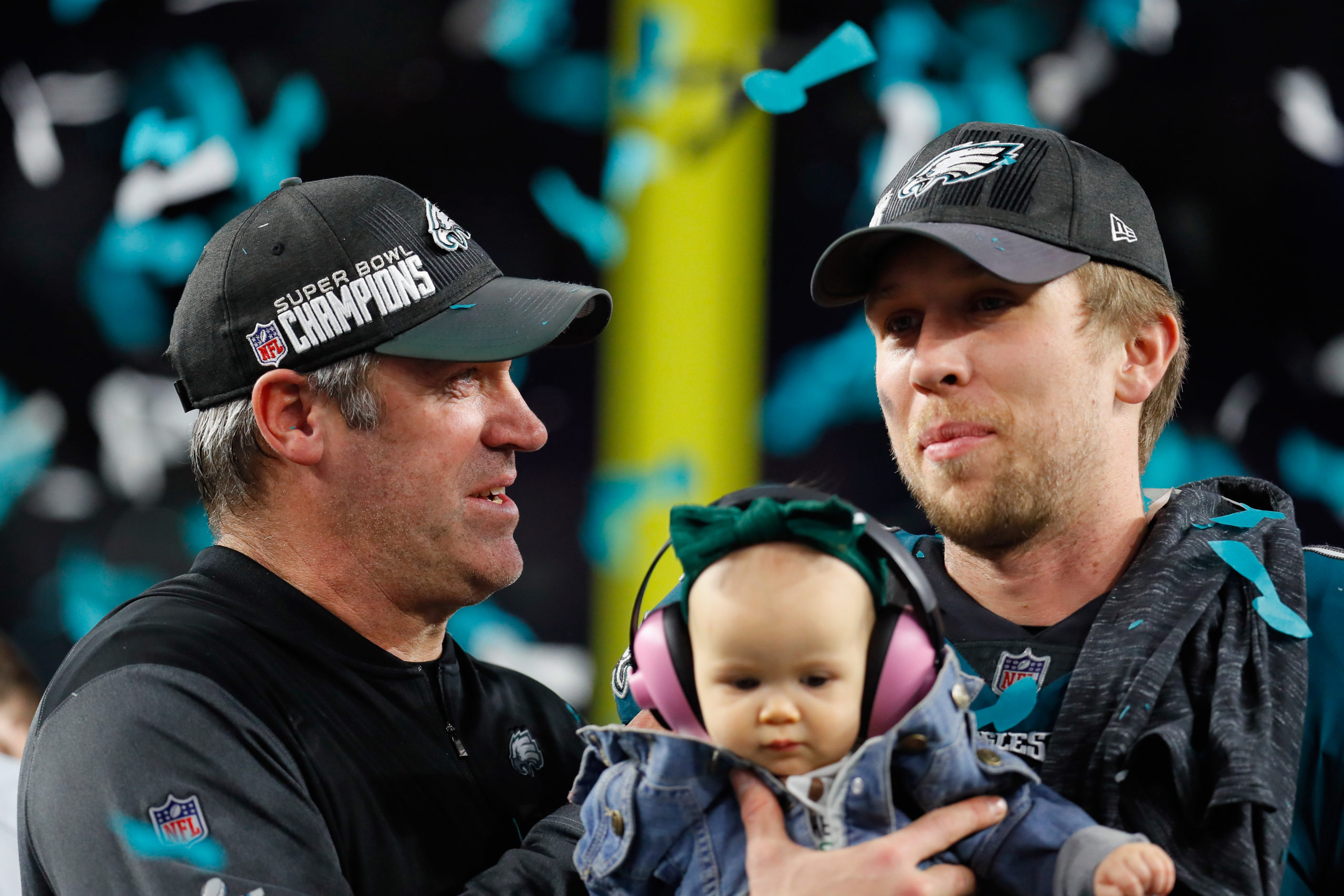 MINNEAPOLIS, MN - FEBRUARY 04: Nick Foles #9 of the Philadelphia Eagles celebrates with his daughter Lily Foles and his head coach Doug Pederson after his 41-33 victory over the New England Patriots in Super Bowl LII at U.S. Bank Stadium on February 4, 2018 in Minneapolis, Minnesota. The Philadelphia Eagles defeated the New England Patriots 41-33. Kevin C. Cox/Getty Images