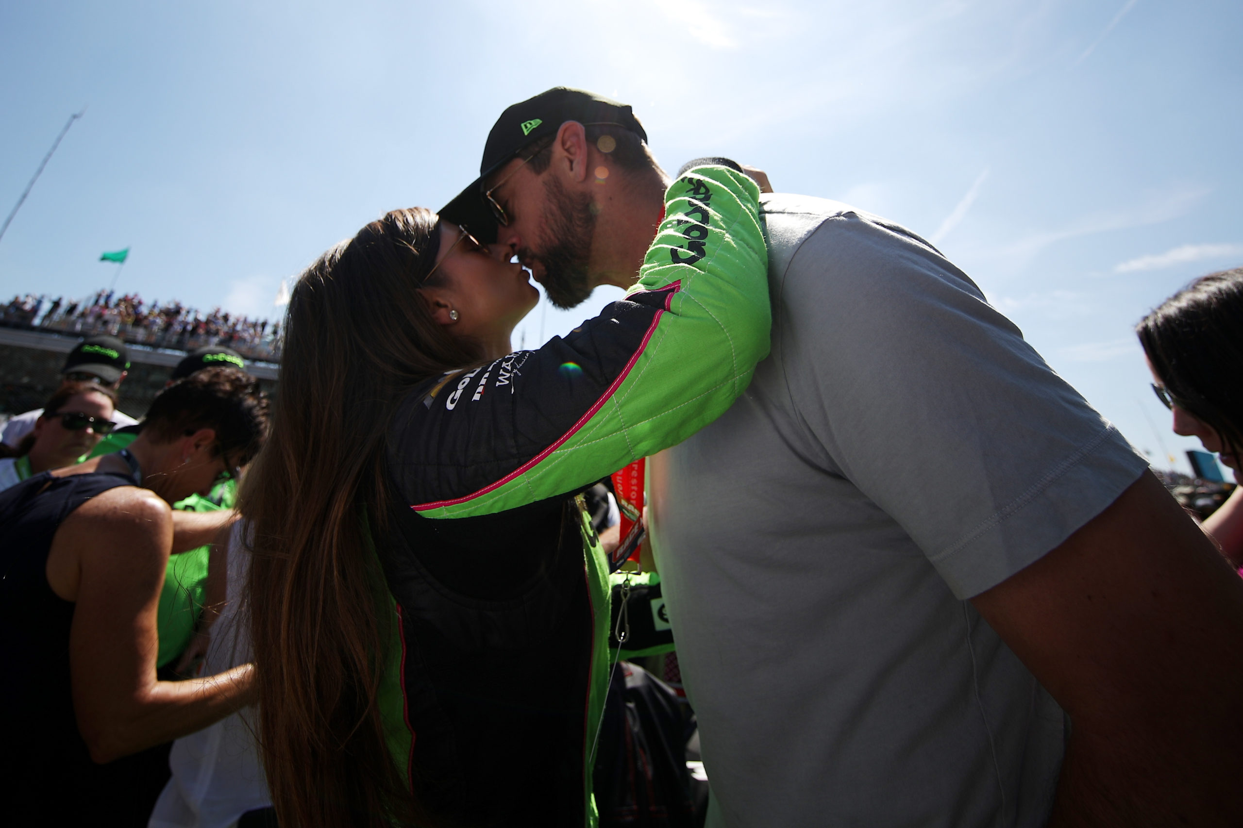 INDIANAPOLIS, IN - MAY 27: Danica Patrick, driver of the #13 GoDaddy Chevrolet kisses Aaron Rodgers prior to the 102nd Running of the Indianapolis 500 at Indianapolis Motorspeedway on May 27, 2018 in Indianapolis, Indiana. Chris Graythen/Getty Images
