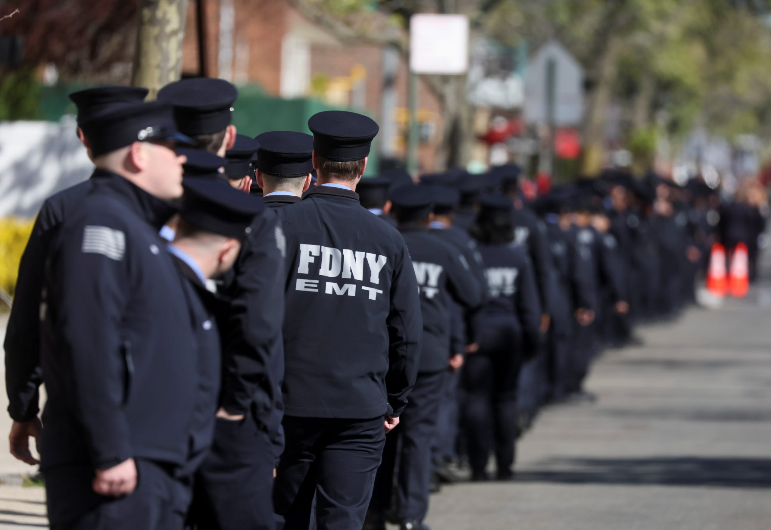 Members of the New York City Fire Department (FDNY) line up for the funeral of New York City Firefighter Timothy Klein at St Francis de Sales Roman Catholic Church in Belle Harbor, New York City, U.S., April 29, 2022. REUTERS/Brendan McDermid