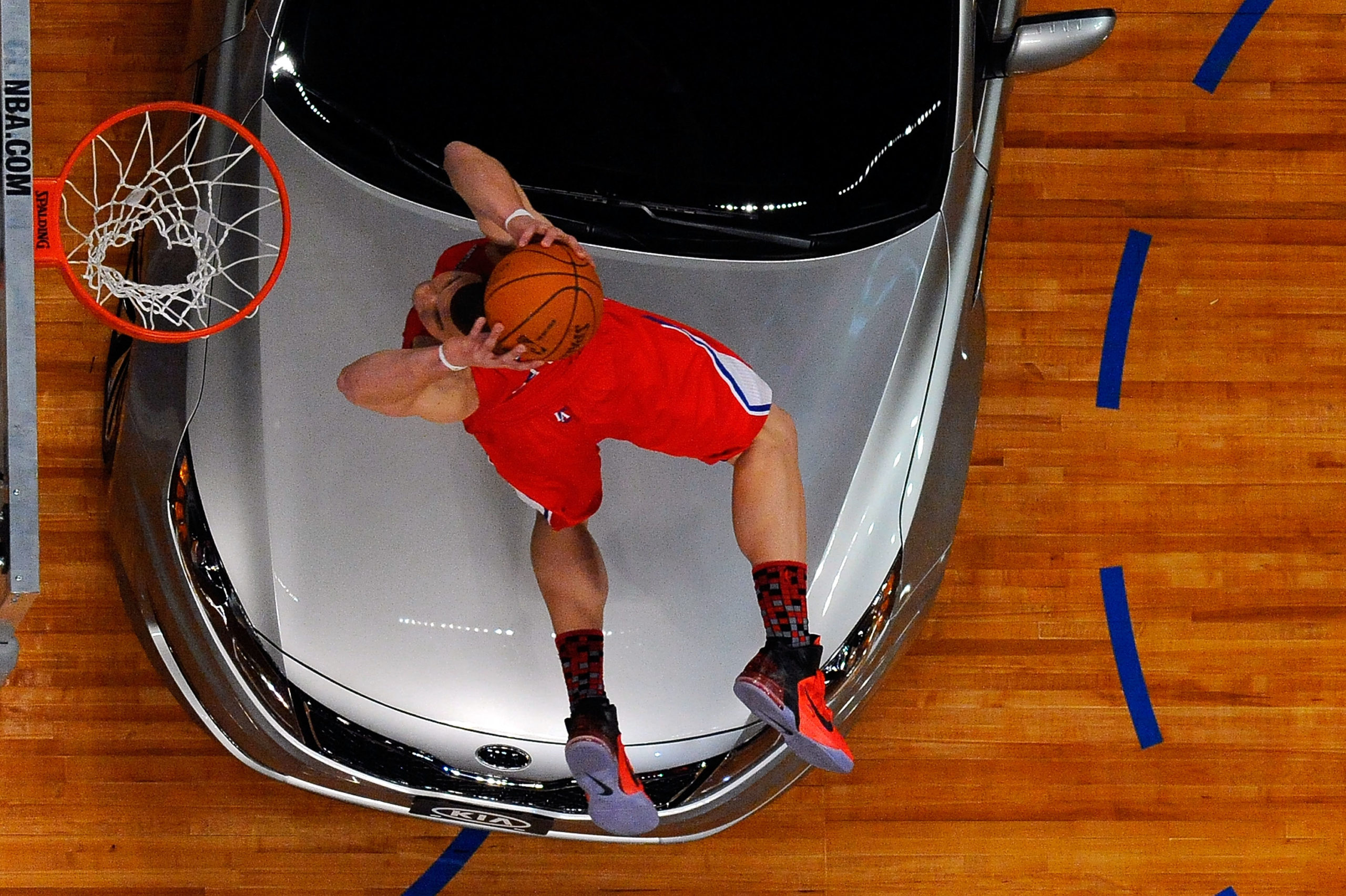 LOS ANGELES, CA - FEBRUARY 19: Blake Griffin #32 of the Los Angeles Clippers dunks the ball over a car in the final round of the Sprite Slam Dunk Contest apart of NBA All-Star Saturday Night at Staples Center on February 19, 2011 in Los Angeles, California. Kevork Djansezian/Getty Images