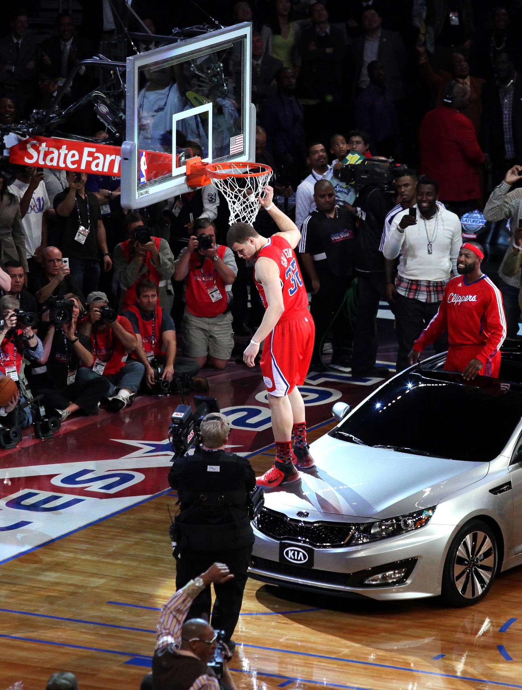 LOS ANGELES, CA - FEBRUARY 19: Blake Griffin from the L.A. Clippers slam dunks over a car with teammate Baron Davis inside during the Sprite Slam Dunk Contest apart of NBA All-Star Saturday Night at Staples Center on February 19, 2011 in Los Angeles, California. Noel Vasquez/Getty Images