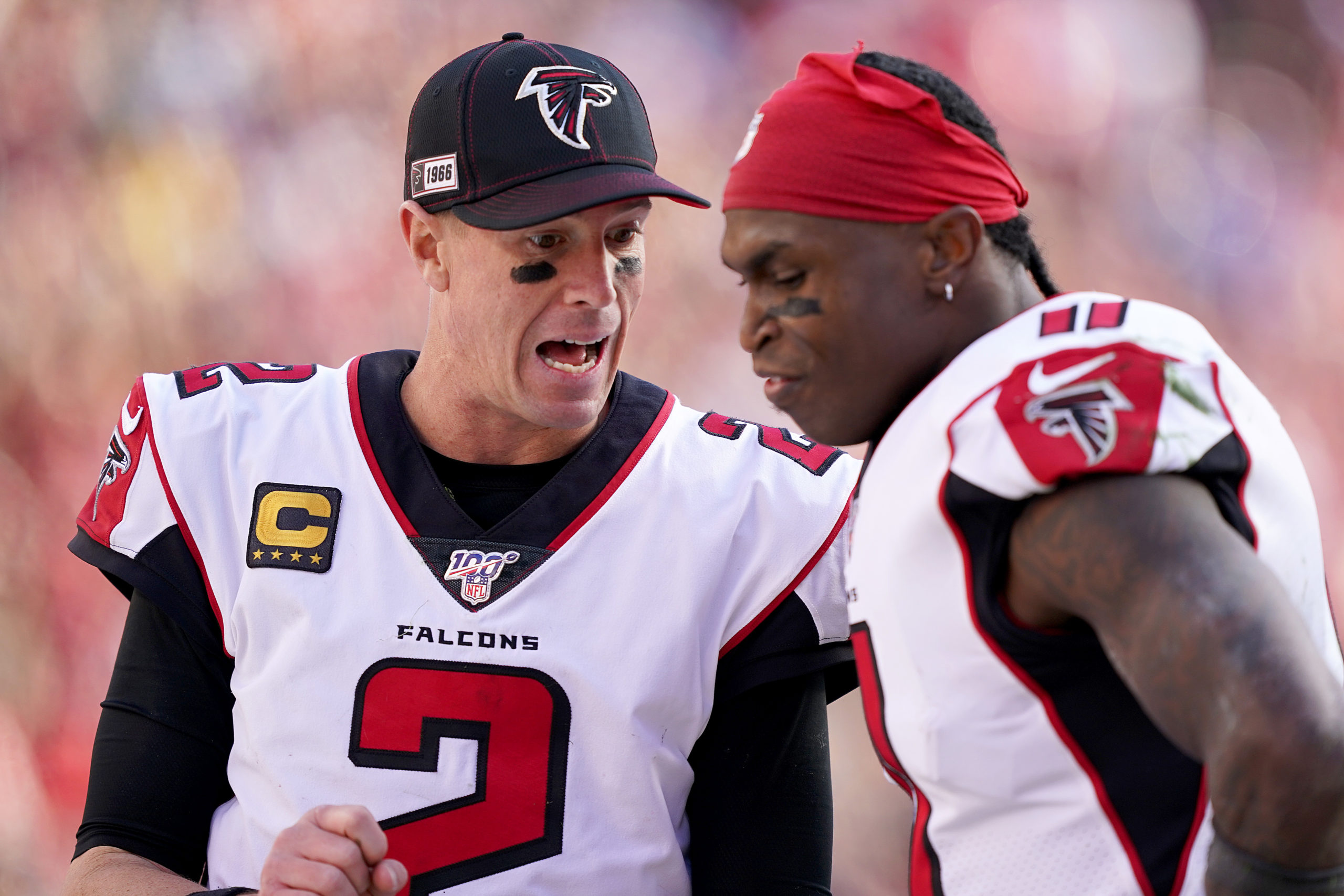 SANTA CLARA, CALIFORNIA - DECEMBER 15: Quarterback Matt Ryan #2 and wide receiver Julio Jones #11 of the Atlanta Falcons talk on the sidlines during the game against the San Francisco 49ers at Levi's Stadium on December 15, 2019 in Santa Clara, California. Thearon W. Henderson/Getty Images