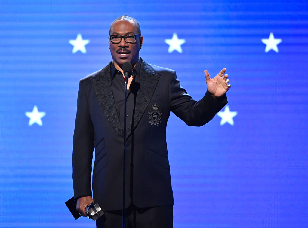 SANTA MONICA, CALIFORNIA - JANUARY 12: Eddie Murphy accepts the Lifetime Achievement Award onstage during the 25th Annual Critics' Choice Awards at Barker Hangar on January 12, 2020 in Santa Monica, California. (Photo by Amy Sussman/Getty Images)
