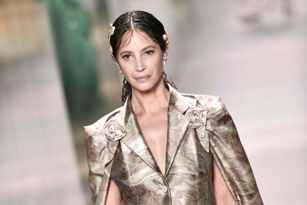 US model Christy Turlington presents a creation of British designer Kim Jones for the Fendi's Spring-Summer 2021 collection during the Paris Haute Couture Fashion Week, in Paris, on January 27, 2021. - British designer Kim Jones presents his first ever Couture Collection for Fendi since he joinded Italian fashion house Fendi as its lead designer for womenswear in September 2020. (Photo by STEPHANE DE SAKUTIN / AFP) (Photo by STEPHANE DE SAKUTIN/AFP via Getty Images)