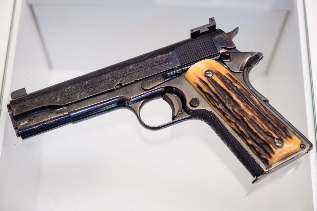 Al Capone's "favorite" .45 calibre hand gun is displayed at Witherell's auction house in Sacramento, California on October 4, 2021. - Guns once owned by Al Capone, one of the most notorious gangsters in United States history, are to go under the hammer at a California auction. The 174 items on sale on October 8 are a collection entitled "A Century of Notoriety: the Estate of Al Capone," in what auctioneers say "will no doubt go down as one of the most important celebrity auctions in history." (Photo by Nick Otto / AFP) (Photo by NICK OTTO/AFP via Getty Images)