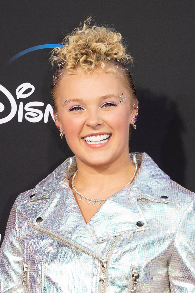 US dancer and singer JoJo Siwa attends the Disney+ "High School Musical: The Musical: The Series" season 3 premiere at Walt Disney Studios on July 27, 2022 in Burbank, California. (Photo by VALERIE MACON / AFP) (Photo by VALERIE MACON/AFP via Getty Images)
