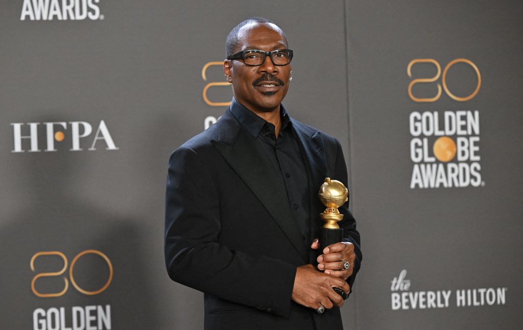 US actor Eddie Murphy poses with the Cecil B. DeMille award in the press room during the 80th annual Golden Globe Awards at The Beverly Hilton hotel in Beverly Hills, California, on January 10, 2023. (Photo by Frederic J. Brown / AFP) (Photo by FREDERIC J. BROWN/AFP via Getty Images)