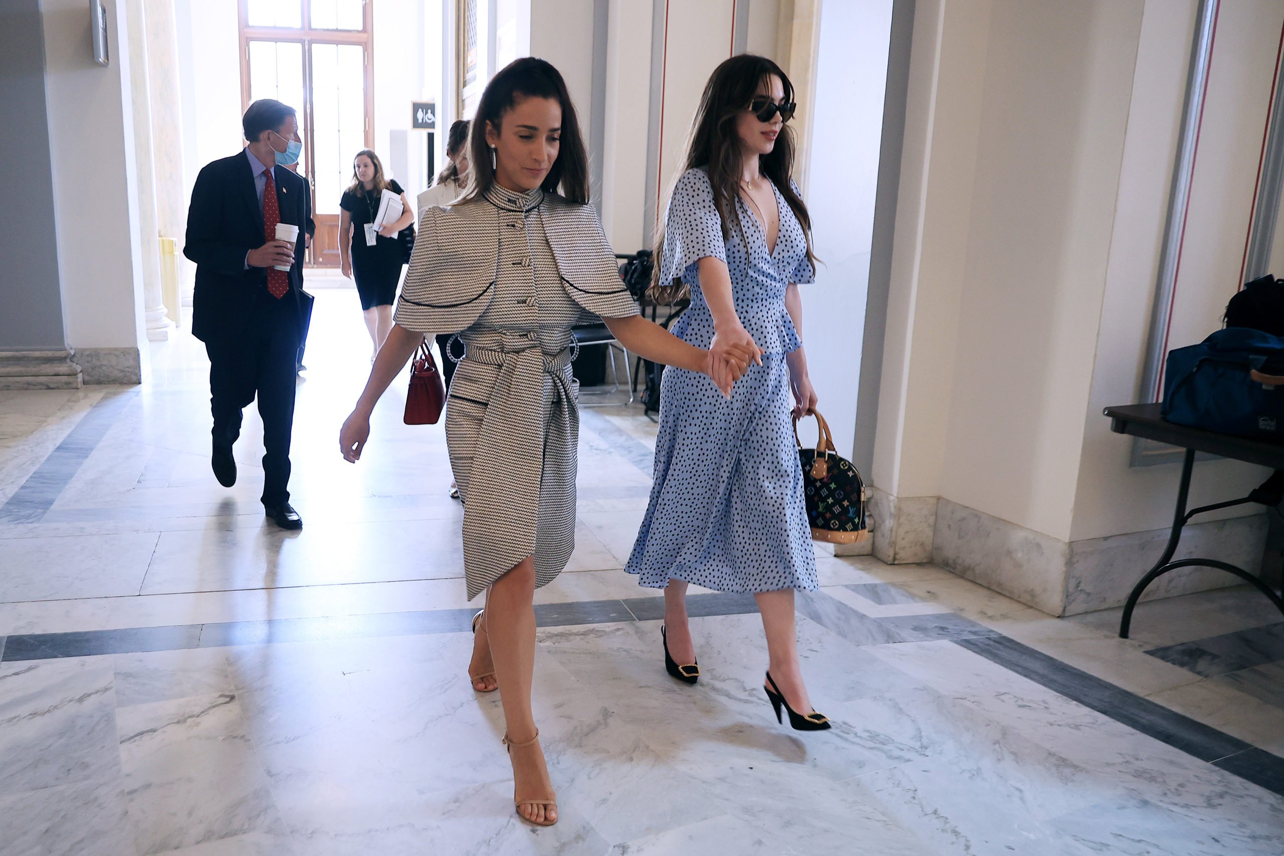 WASHINGTON, DC - SEPTEMBER 15: Former U.S. Olympic gymnasts Aly Raisman (L) and McKayla Maroney arrive for a news conference in the Russell Senate Office Building after testifying before the Senate Judiciary Committee on September 15, 2021 in Washington, DC. Raisman, Maroney and other champion gymnasts testified about the abuse they experienced at the hands of Larry Nassar, the now-imprisoned U.S. women's national gymnastics team doctor, and the Federal Bureau of Investigatoin’s lack of urgency when handling their cases. Chip Somodevilla/Getty Images