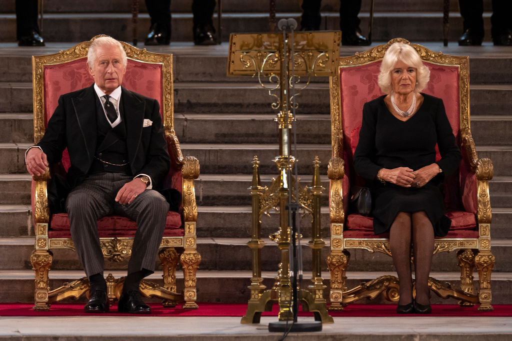 LONDON, ENGLAND - SEPTEMBER 12: King Charles III and Camilla, Queen Consort take part in an address in Westminster Hall on September 12, 2022 in London, England. The Lord Speaker and the Speaker of the House of Commons presented an Address to His Majesty on behalf of their respective House in Westminster Hall following the death of Her Majesty Queen Elizabeth II. The King replied to the Addresses. Queen Elizabeth II died at Balmoral Castle in Scotland on September 8, 2022, and is succeeded by her eldest son, King Charles III. (Photo by Dan Kitwood/Getty Images)