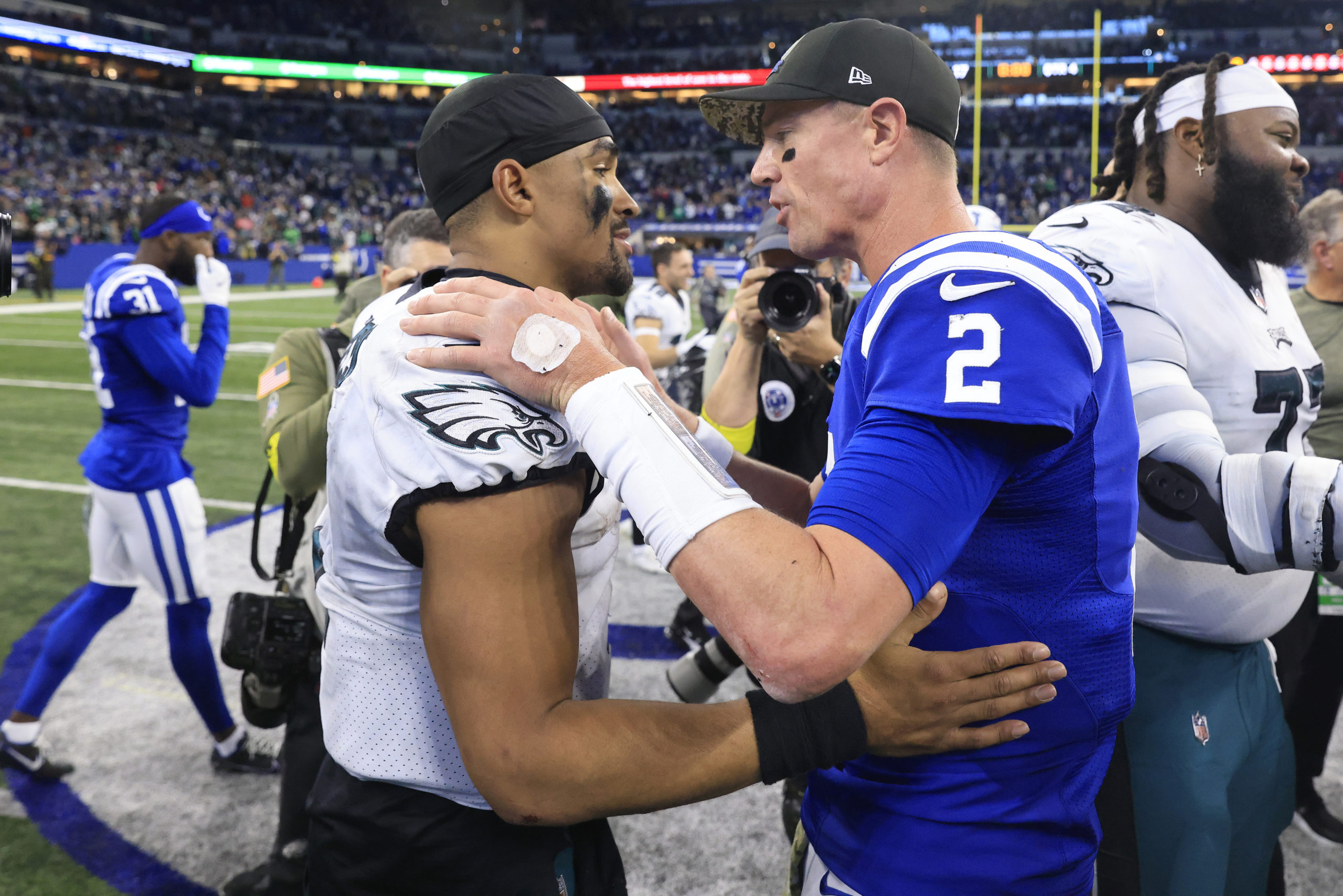 INDIANAPOLIS, INDIANA - NOVEMBER 20: Jalen Hurts #1 of the Philadelphia Eagles and Matt Ryan #2 of the Indianapolis Colts talk after Philadelphia's 17-16 win at Lucas Oil Stadium on November 20, 2022 in Indianapolis, Indiana. Justin Casterline/Getty Images