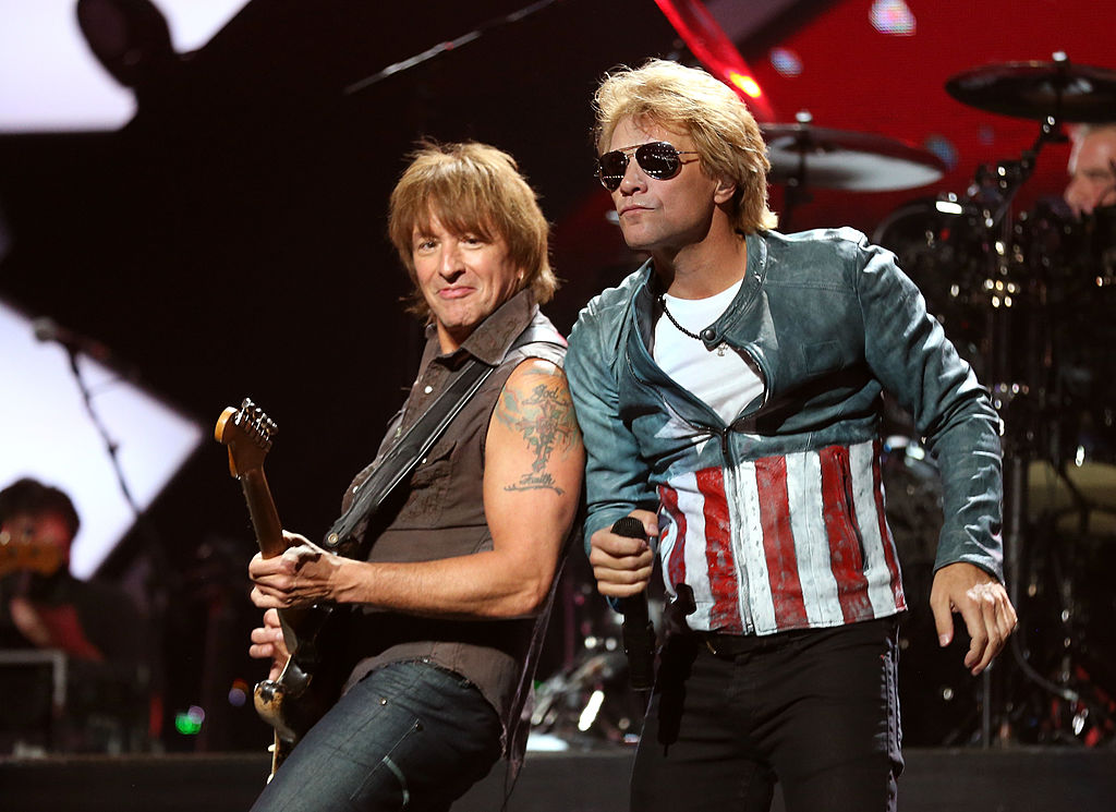 LAS VEGAS, NV - SEPTEMBER 21: Guitarist Richie Sambora (L) and singer Jon Bon Jovi of Bon Jovi perform onstage during the 2012 iHeartRadio Music Festival at the MGM Grand Garden Arena on September 21, 2012 in Las Vegas, Nevada. (Photo by Christopher Polk/Getty Images for Clear Channel)