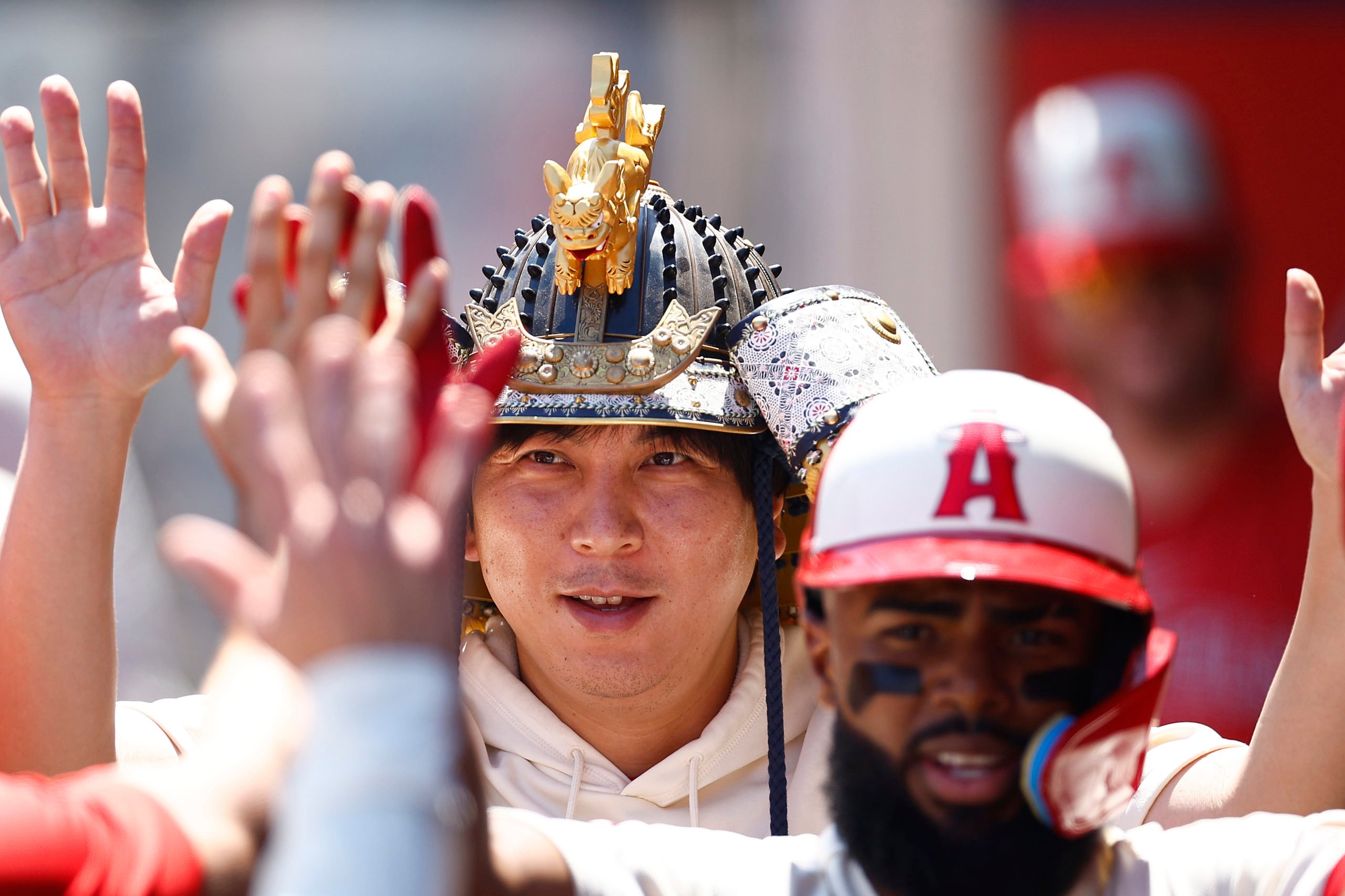 ANAHEIM, CALIFORNIA - AUGUST 23: Ippei Mizuhara, interpreter for Shohei Ohtani #17 of the Los Angeles Angels in the first inning during game one of a doubleheader at Angel Stadium of Anaheim on August 23, 2023 in Anaheim, California. Ronald Martinez/Getty Images