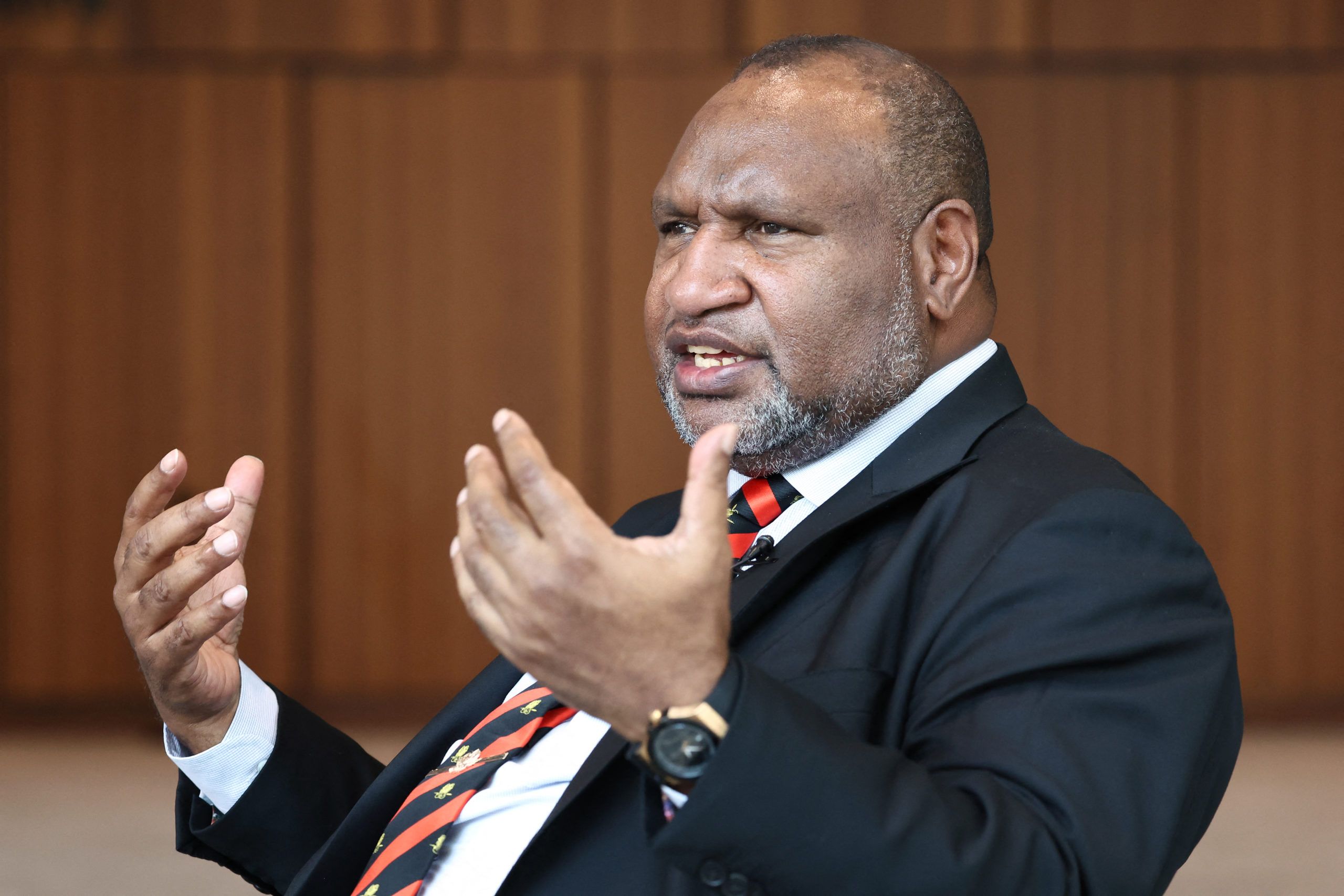 Papua New Guinea's Prime Minister James Marape reacts as he speaks during an interview in Sydney on December 11, 2023. (Photo by DAVID GRAY / AFP) (Photo by DAVID GRAY/AFP via Getty Images)