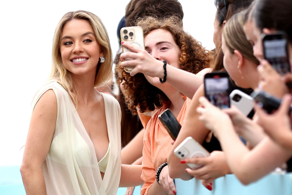 SYDNEY, AUSTRALIA - DECEMBER 18: Sydney Sweeney greets fans at the Sydney screening of "Anyone But You" at Hoyts Entertainment Quarter on December 18, 2023 in Sydney, Australia. (Photo by Brendon Thorne/Getty Images)