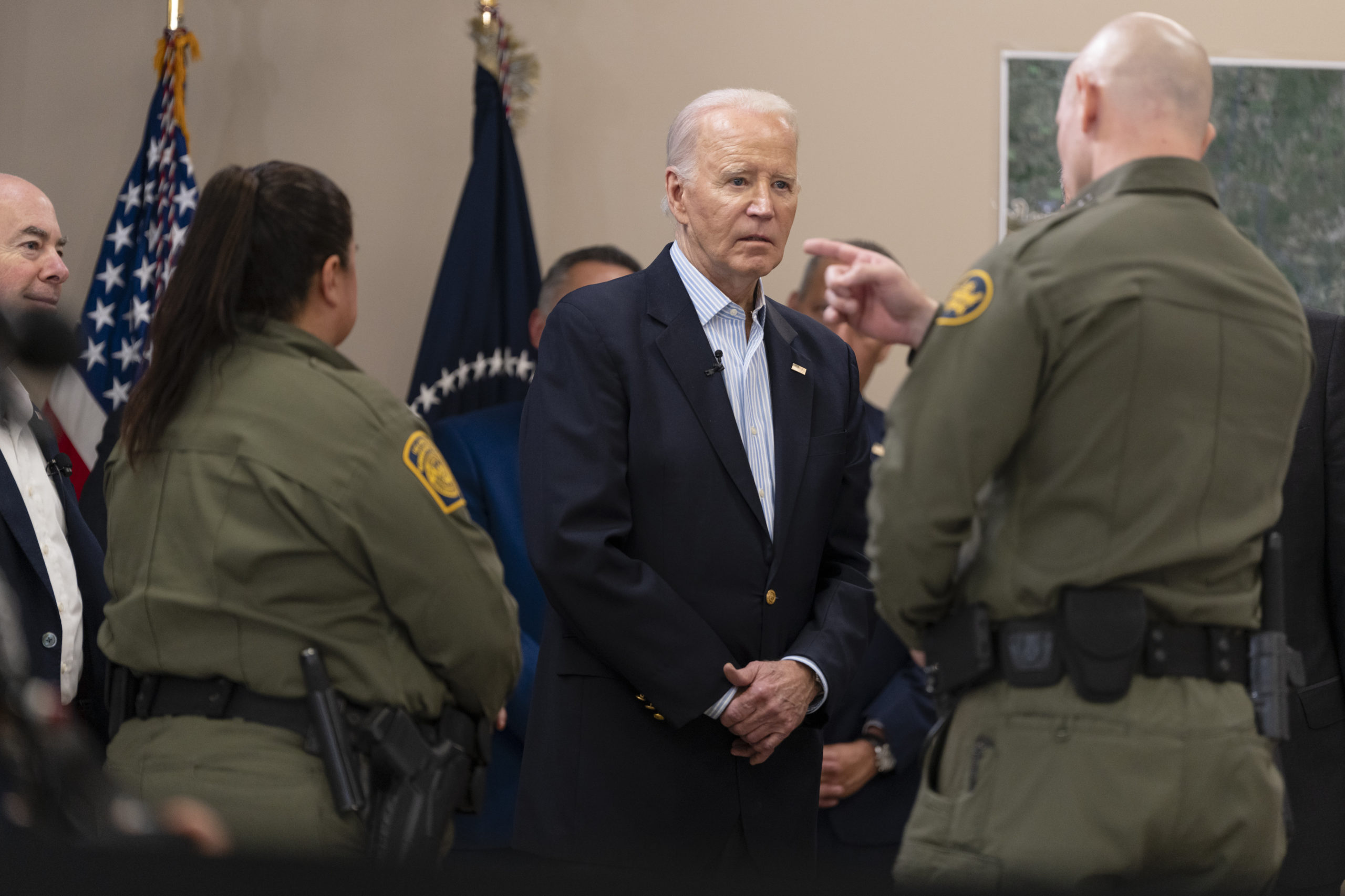 President Joe Biden listens to a U.S. Customs and Border Protection officer during a presentation about immigration and border security at the Brownsville Station on February 29, 2024 in Olmito, Texas. The President visited the border near Brownsville on the same day as a dueling trip made by former President Donald Trump to neighboring Eagle Pass, Texas. (Photo by Cheney Orr/Getty Images)