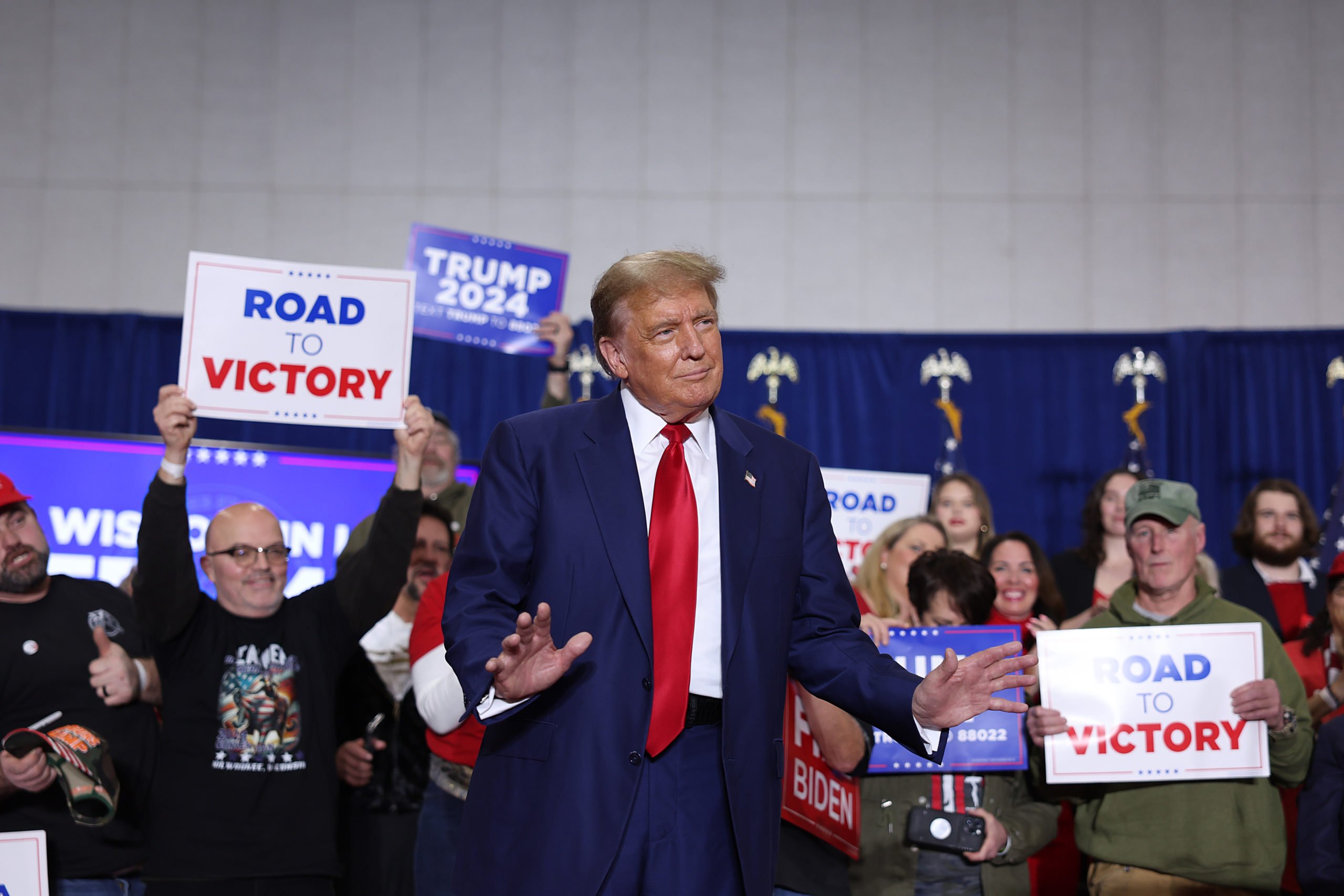 Former President Donald Trump arrives for a rally on April 02, 2024 in Green Bay, Wisconsin. At the rally, Trump spoke next to an empty lectern on the stage and challenged President Joe Biden to debate him. The Wisconsin primary is being held today. (Photo by Scott Olson/Getty Images)