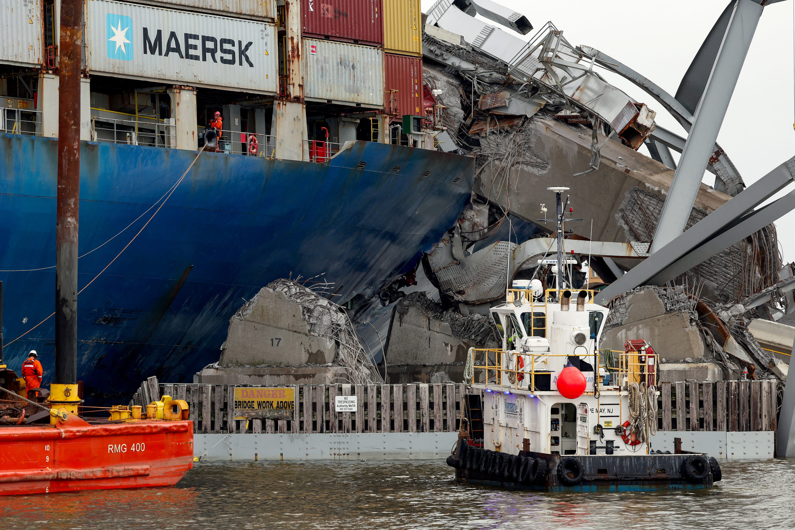 Salvage personnel work on the wreckage of the cargo ship Dali after it collided and collapsed the Francis Scott Key Bridge on April 04, 2024 in Baltimore, Maryland. (Photo by Kevin Dietsch/Getty Images)