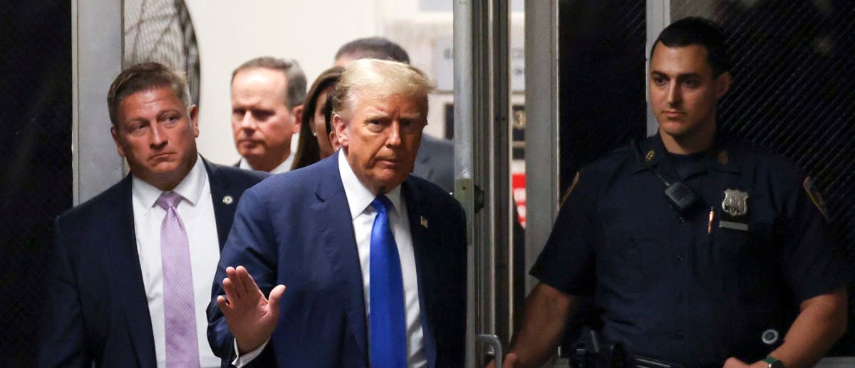 NEW YORK, NEW YORK - APRIL 22: Former U.S. President Donald Trump returns to court after a recess during opening statements in his trial for allegedly covering up hush money payments at Manhattan Criminal Court on April 22, 2024 in New York City. Former President Donald Trump faces 34 felony counts of falsifying business records in the first of his criminal cases to go to trial. (Photo by Yuki Iwamura-Pool/Getty Images)