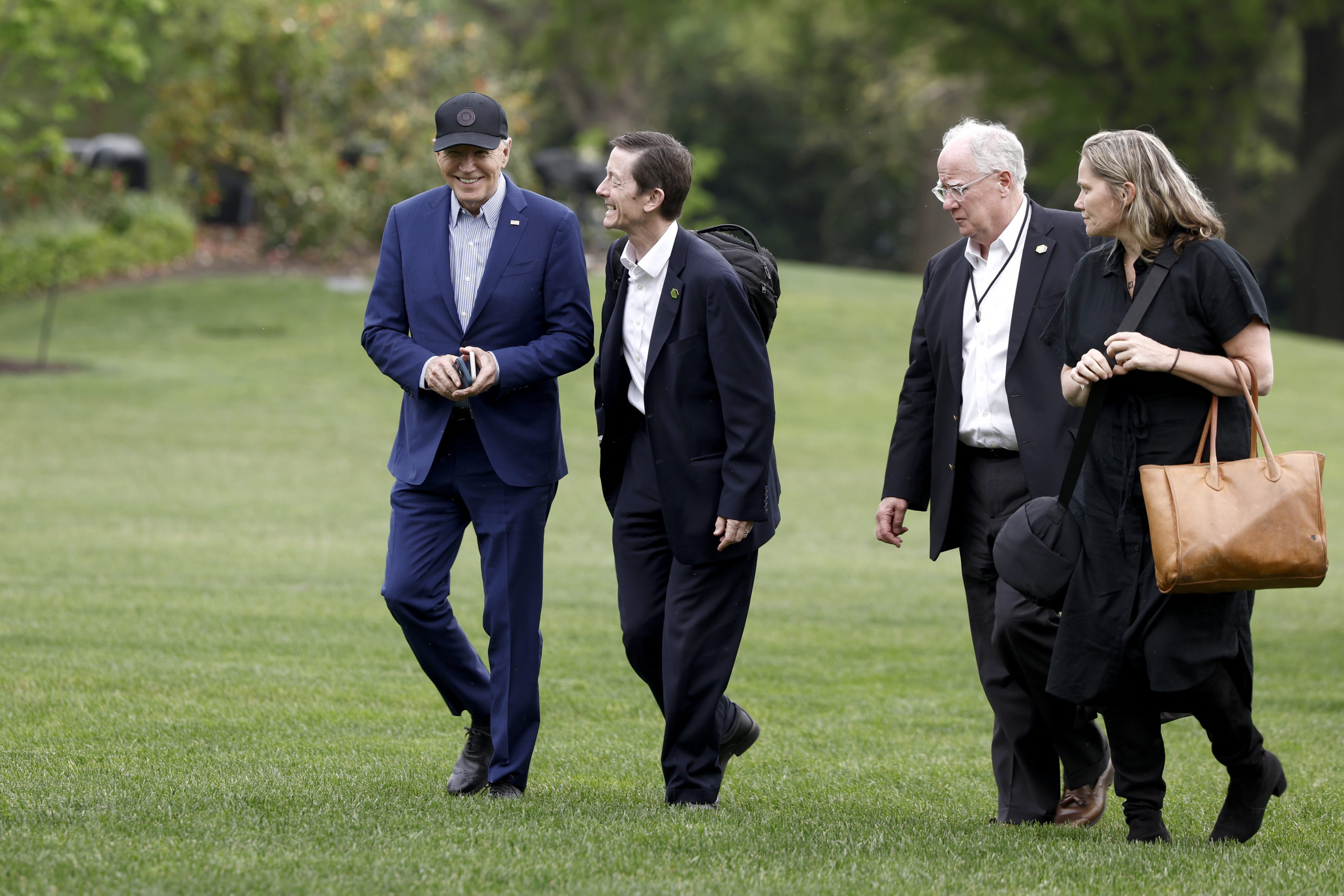 U.S. President Joe Biden walks to the White House with senior members of his staff, including Bruce Reed, assistant to the president and deputy chief of staff; Mike Donilon, senior advisor; and Deputy Chief of Staff Annie Tomasini, after landing on the South Lawn in Marine One on April 17, 2024 in Washington, DC. Biden spent the night in the Pittsburgh area, delivering remarks at the United Steel Workers headquarters. (Photo by Anna Moneymaker/Getty Images)