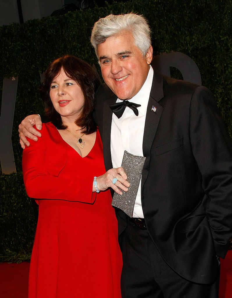 WEST HOLLYWOOD, CA - FEBRUARY 22: Comedian Jay Leno (R) and wife Mavis Nicholson arrive at the 2009 Vanity Fair Oscar Party hosted by Graydon Carter held at the Sunset Tower on February 22, 2009 in West Hollywood, California. (Photo by Michael Buckner/Getty Images)