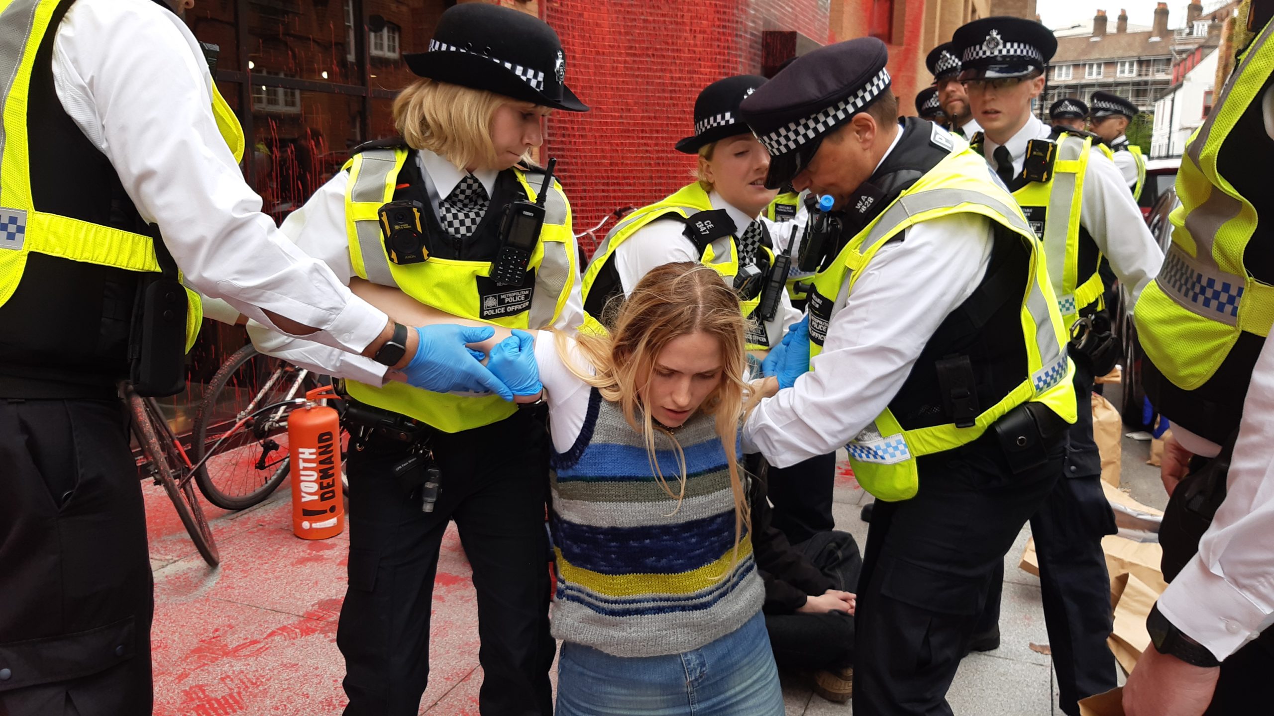 A Youth Demand Protester is detained by police in the U.K. 4/8/24. Photo courtesy of Youth Demand.