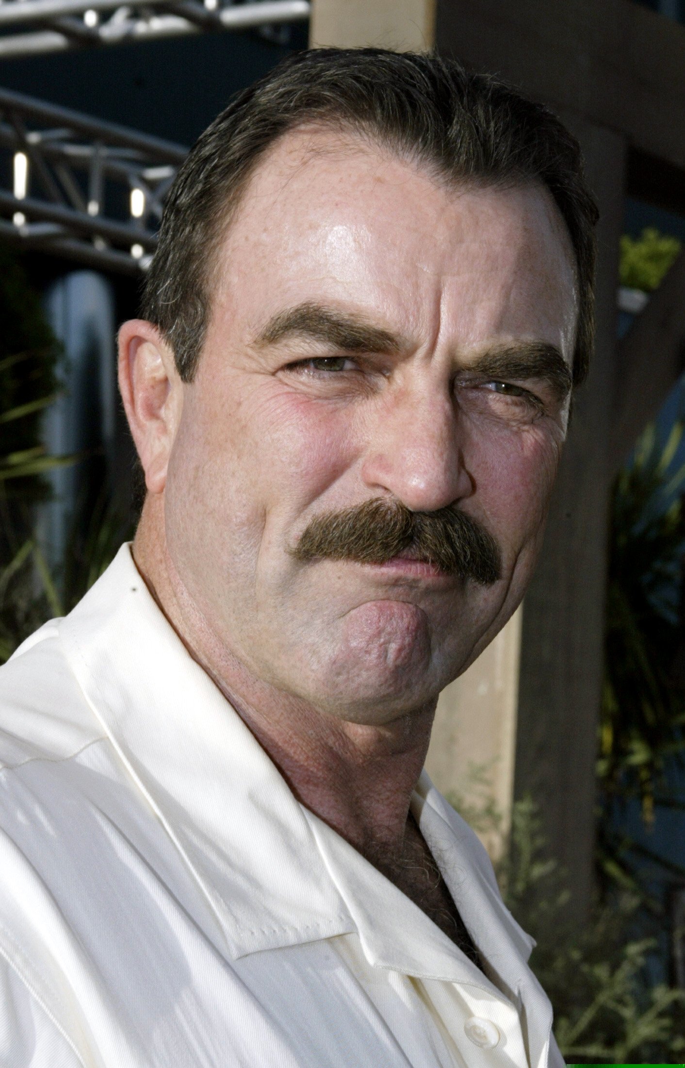 Actor Tom Selleck arrives as a guest at the premiere of the new Western film "Open Range" in Hollywood August 11, 2003. [Kevin Costner directed and stars in the film about a group of cowboys who are moving their cattle across the prairies of the west. The film, also stars Robert Duvall and Annette Bening and opens August 15 in the United States.]