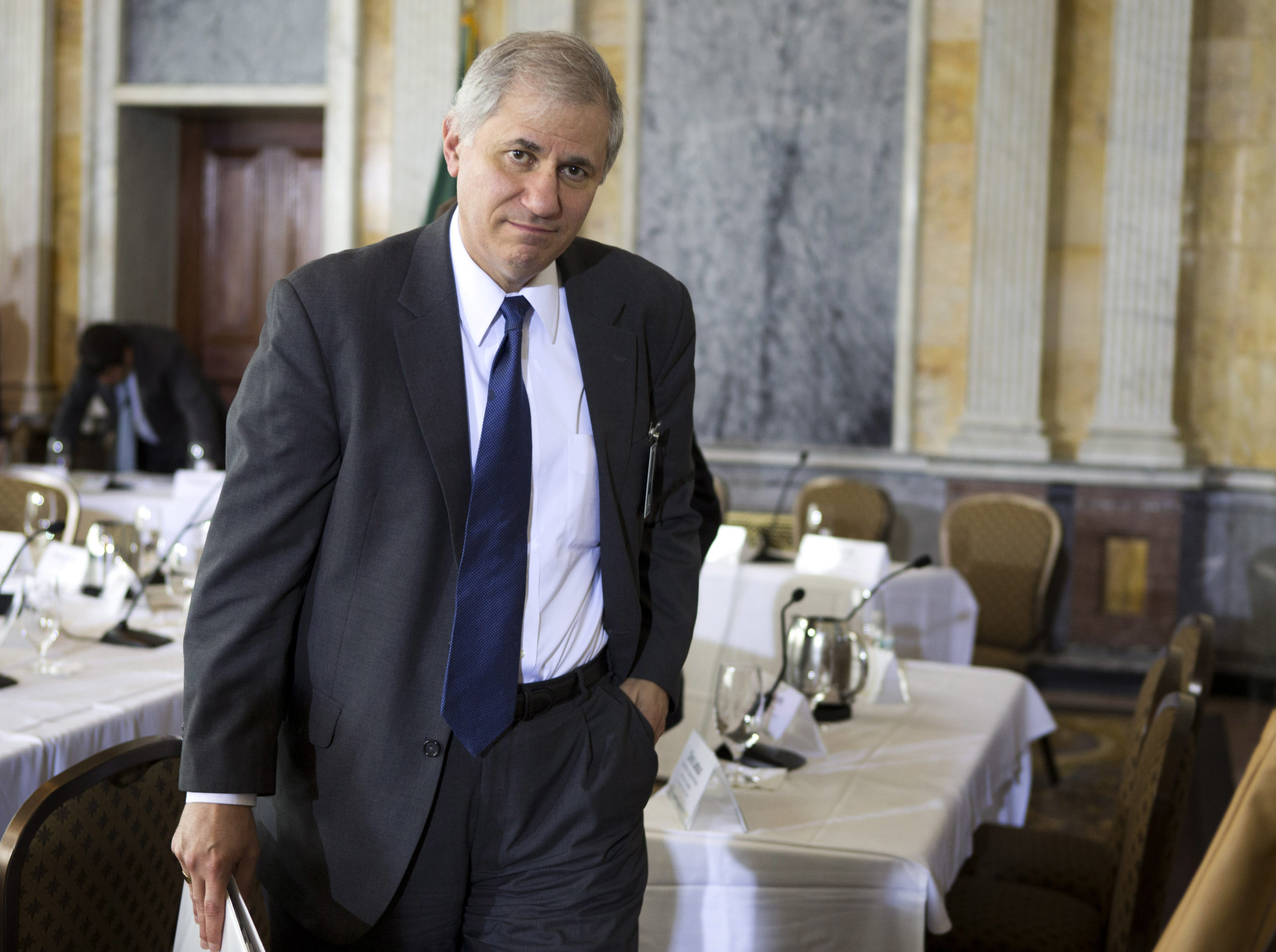 Martin Gruenberg, acting chairman of the Federal Deposit Insurance Corp., departs a meeting of the Financial Stability Oversight Council in Washington April 3, 2012. REUTERS/Joshua Roberts (UNITED STATES - Tags: POLITICS)