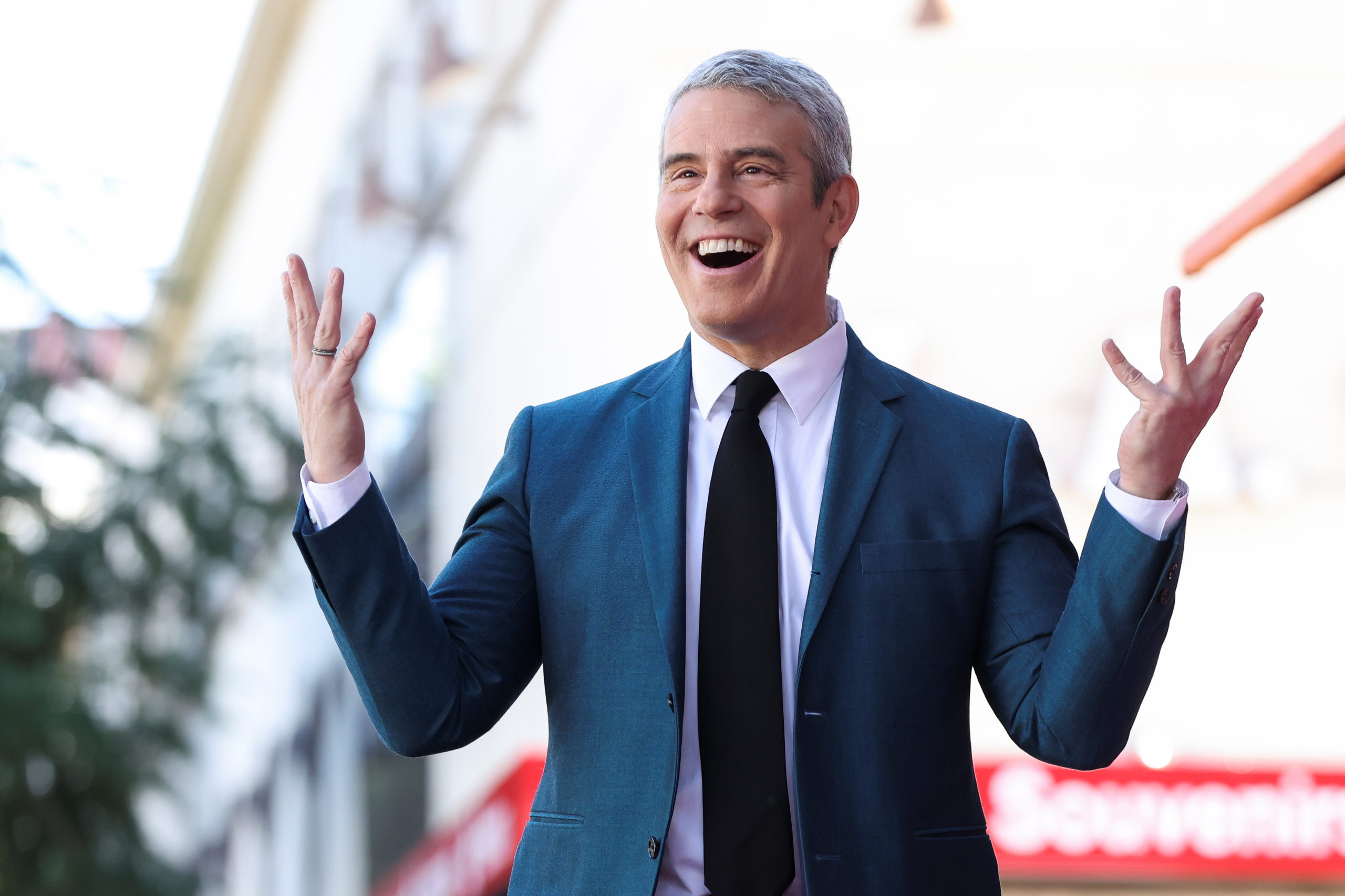 Television host Andy Cohen reacts prior to unveiling of his star on the Hollywood Walk of Fame in Los Angeles, California, U.S., February 4, 2022. REUTERS/Mario Anzuoni