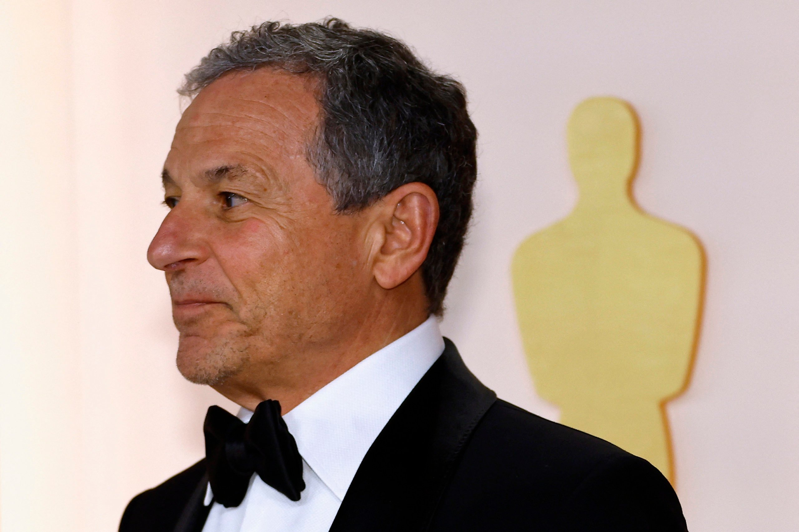 Walt Disney Co. CEO Bob Iger poses on the champagne-colored red carpet during the Oscars arrivals at the 95th Academy Awards in Hollywood, Los Angeles, California, U.S., March 12, 2023. REUTERS/Eric Gaillard