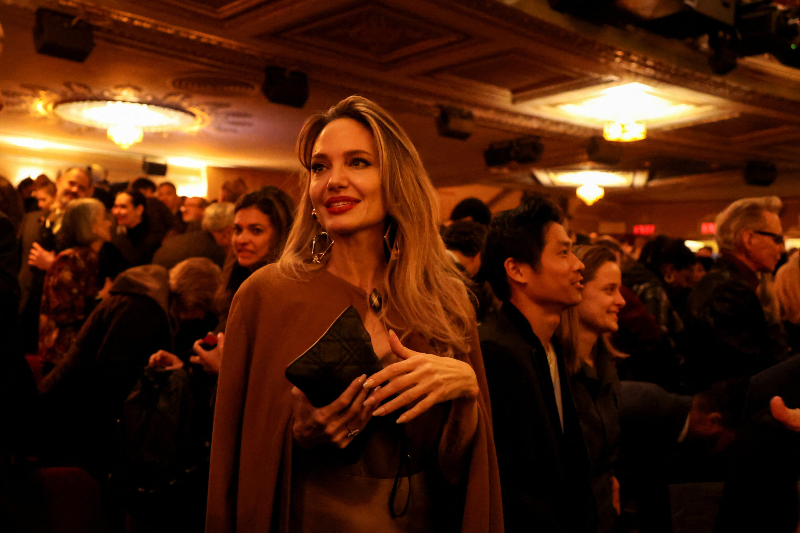 Angelina Jolie reacts after attending the opening night of The Outsiders at the Bernard B. Jacobs Theatre in New York City, New York, U.S., April 11, 2024. REUTERS/Caitlin Ochs