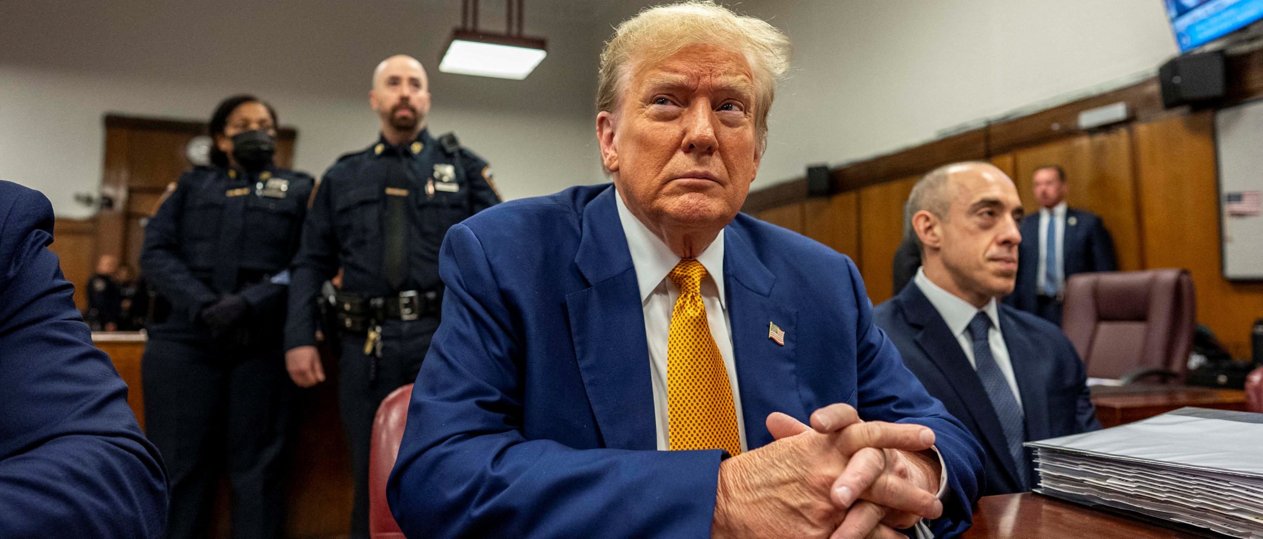 Republican presidential candidate, former U.S. President Donald Trump sits inside Manhattan Criminal Court room waiting for the start of the proceedings of his criminal trial at the New York State Supreme Court in New York, New York, Thursday, May, 2, 2024. Mark Peterson/Pool via REUTERS